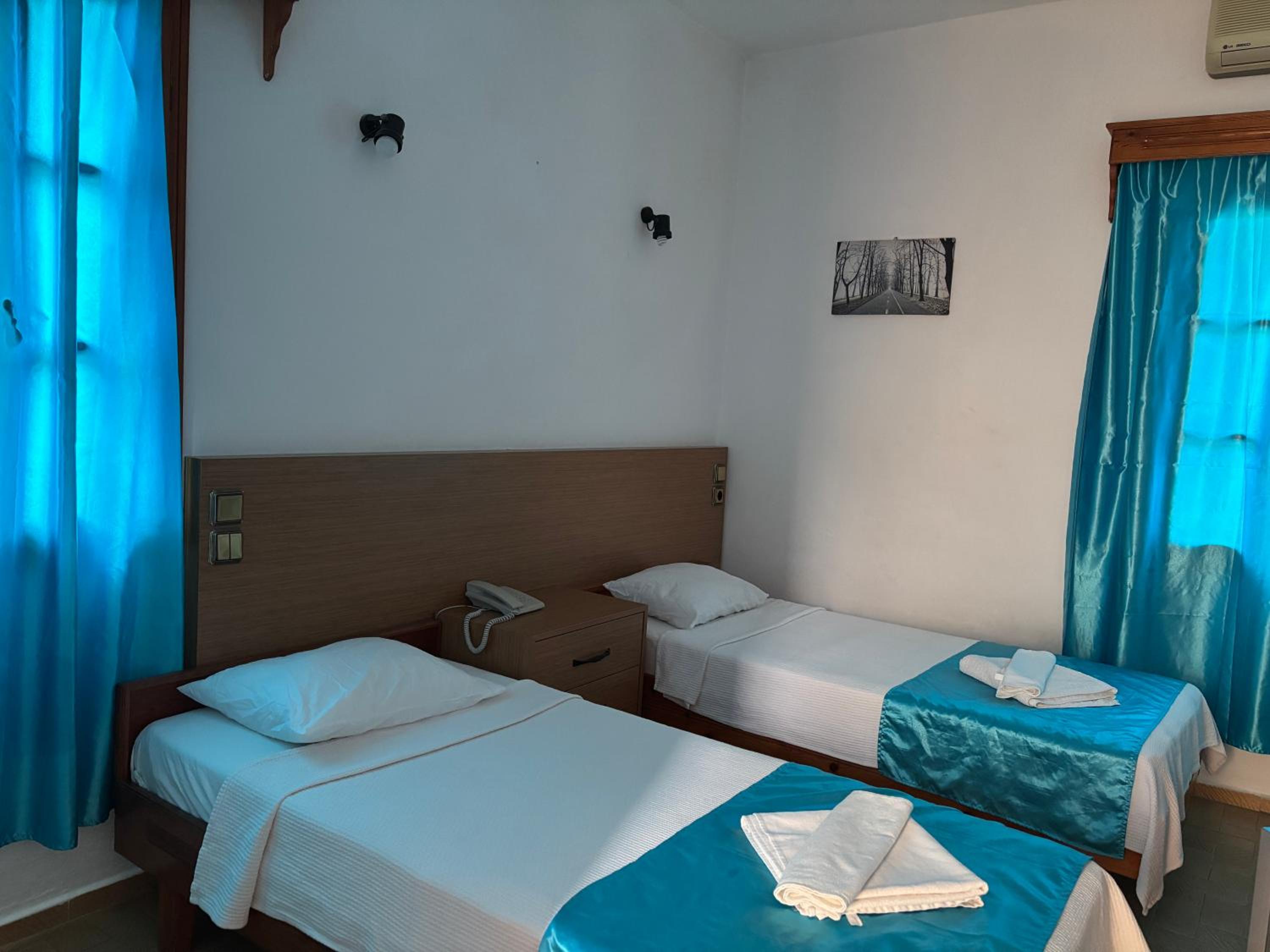 Twin Room - Photo 1