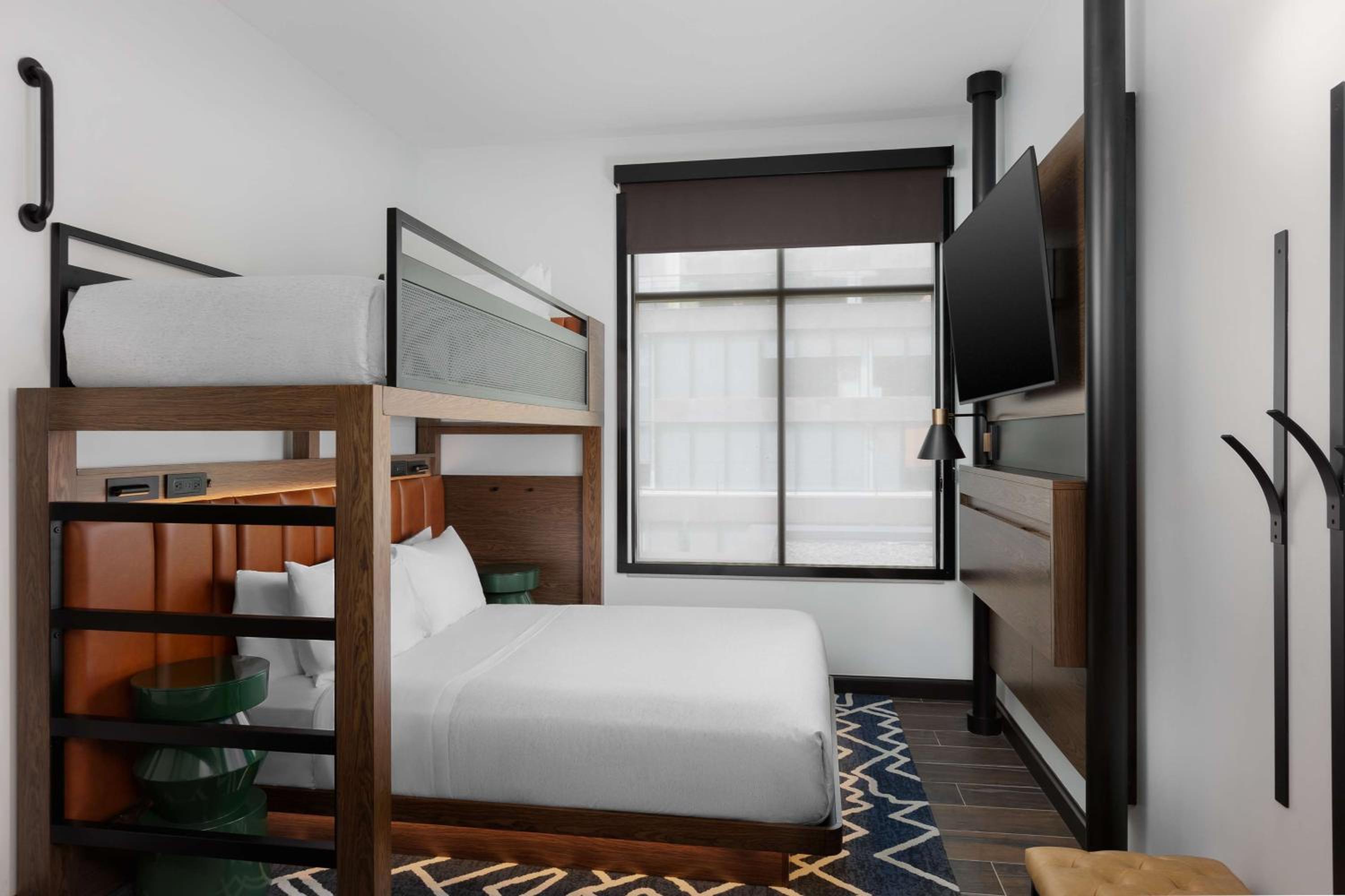 Bunk Room with Twin Beds Over Queen Bed - Photo 1