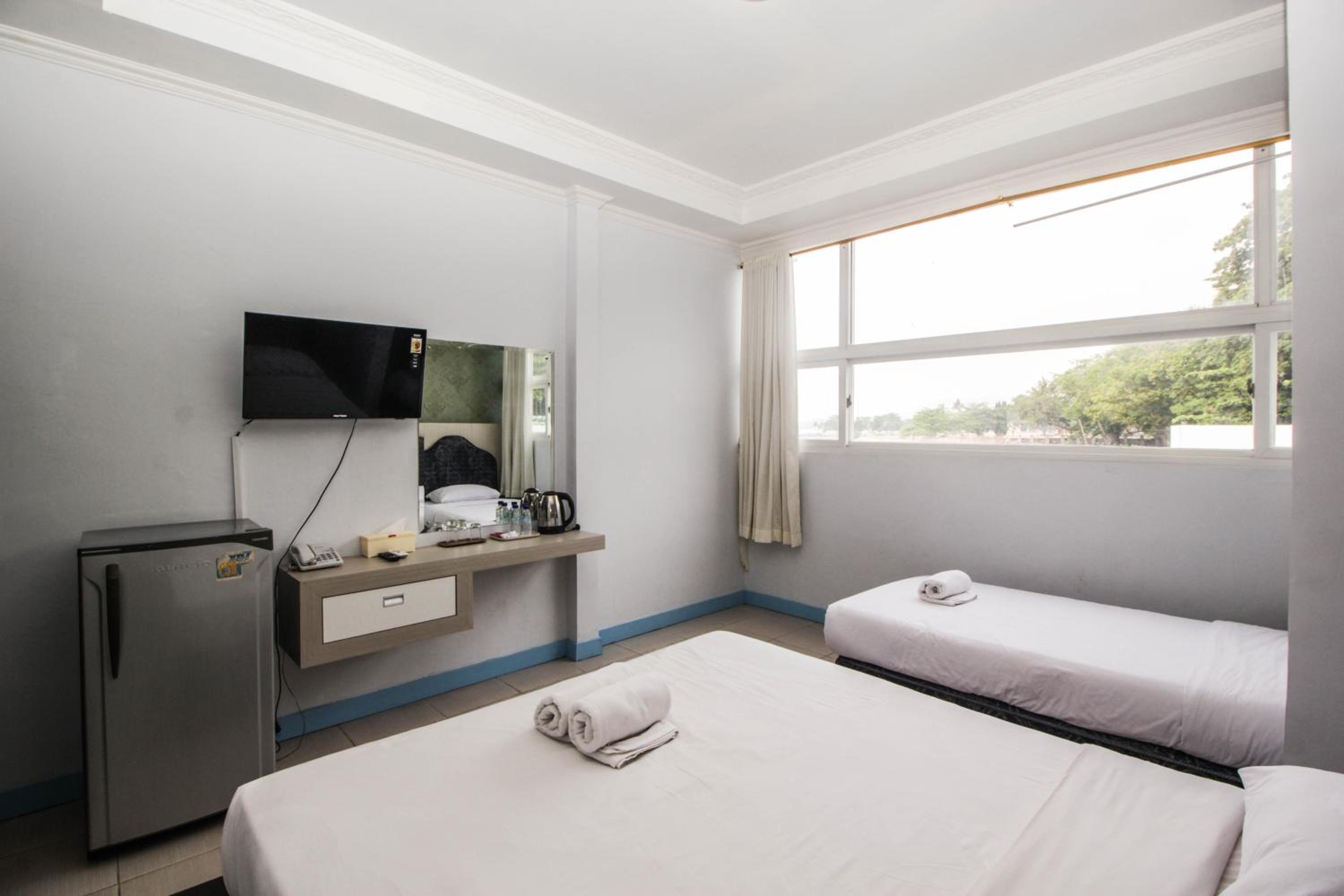 Deluxe Triple Room - Photo 1