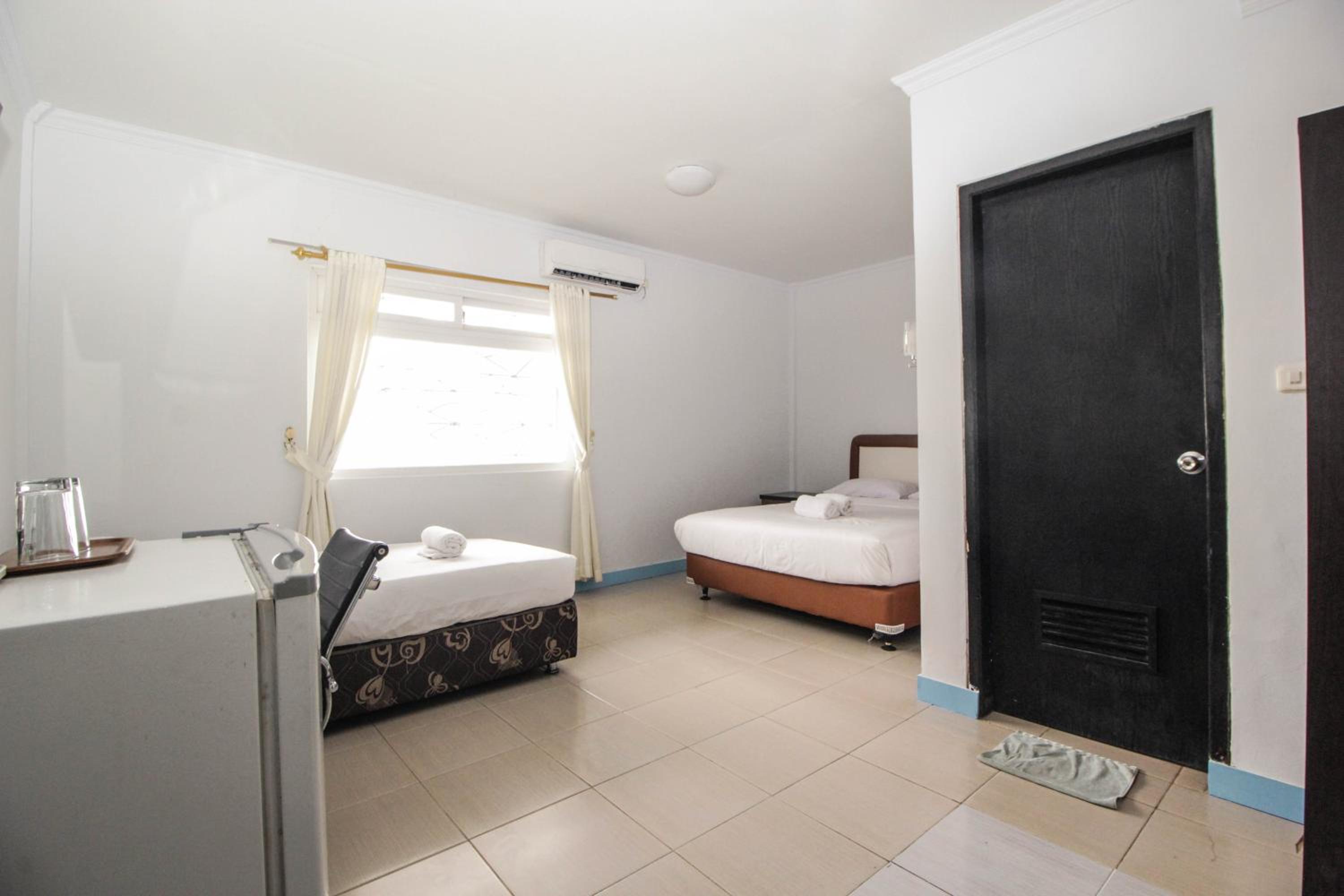 Deluxe Triple Room - Photo 6