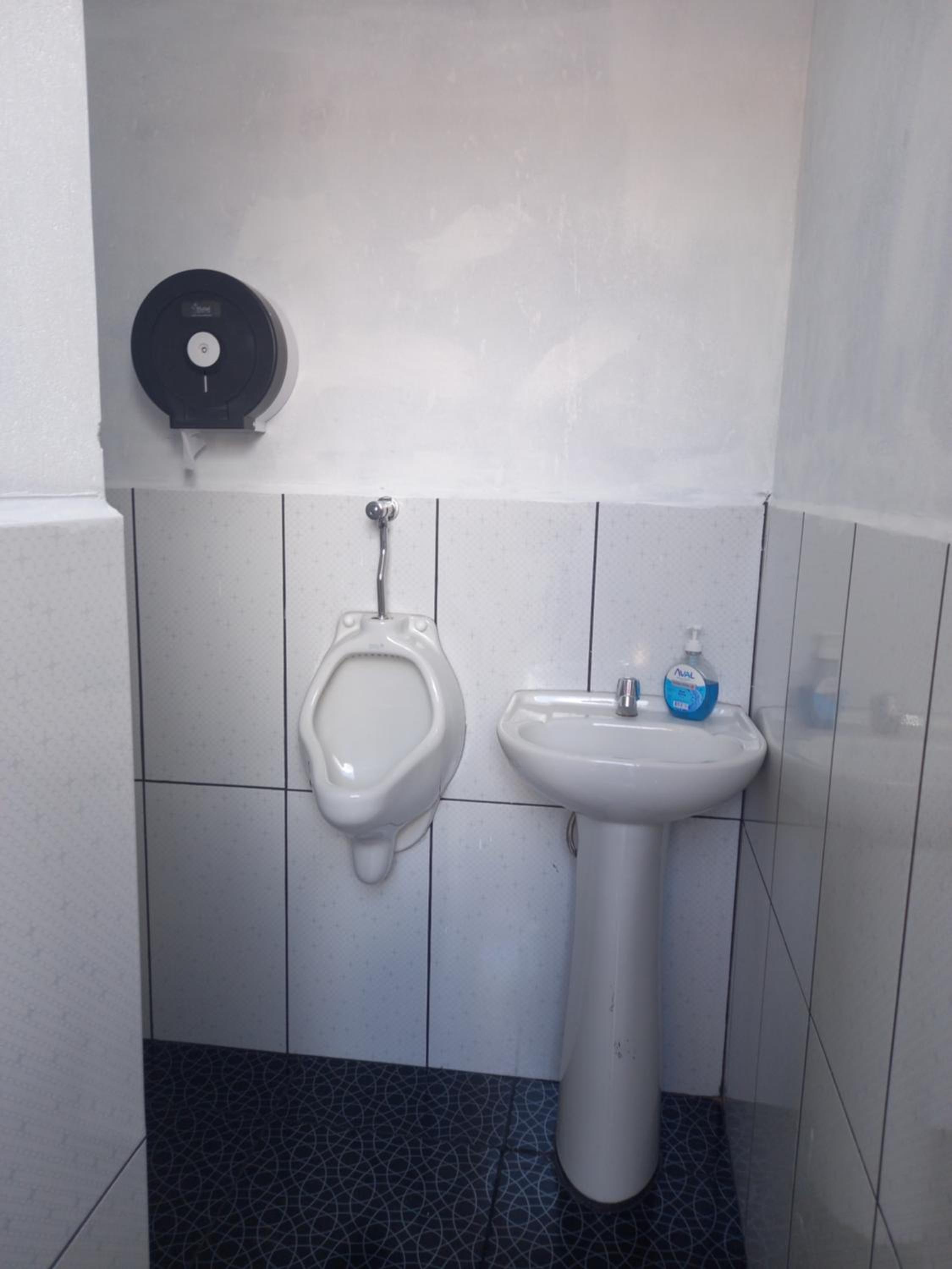 Basic Triple Room With Shared Bathroom photo 3