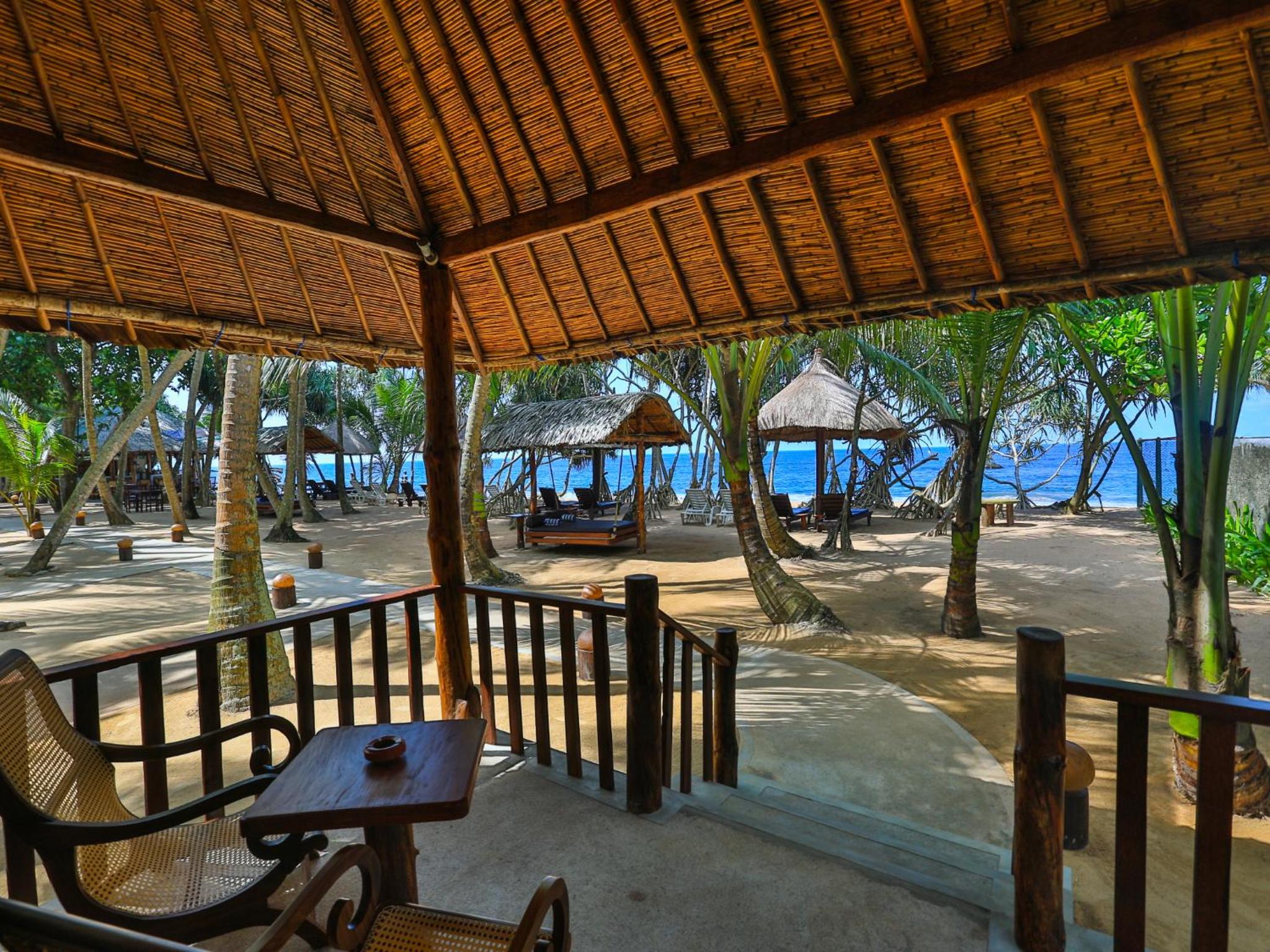 Cabana de playa con vista al mar