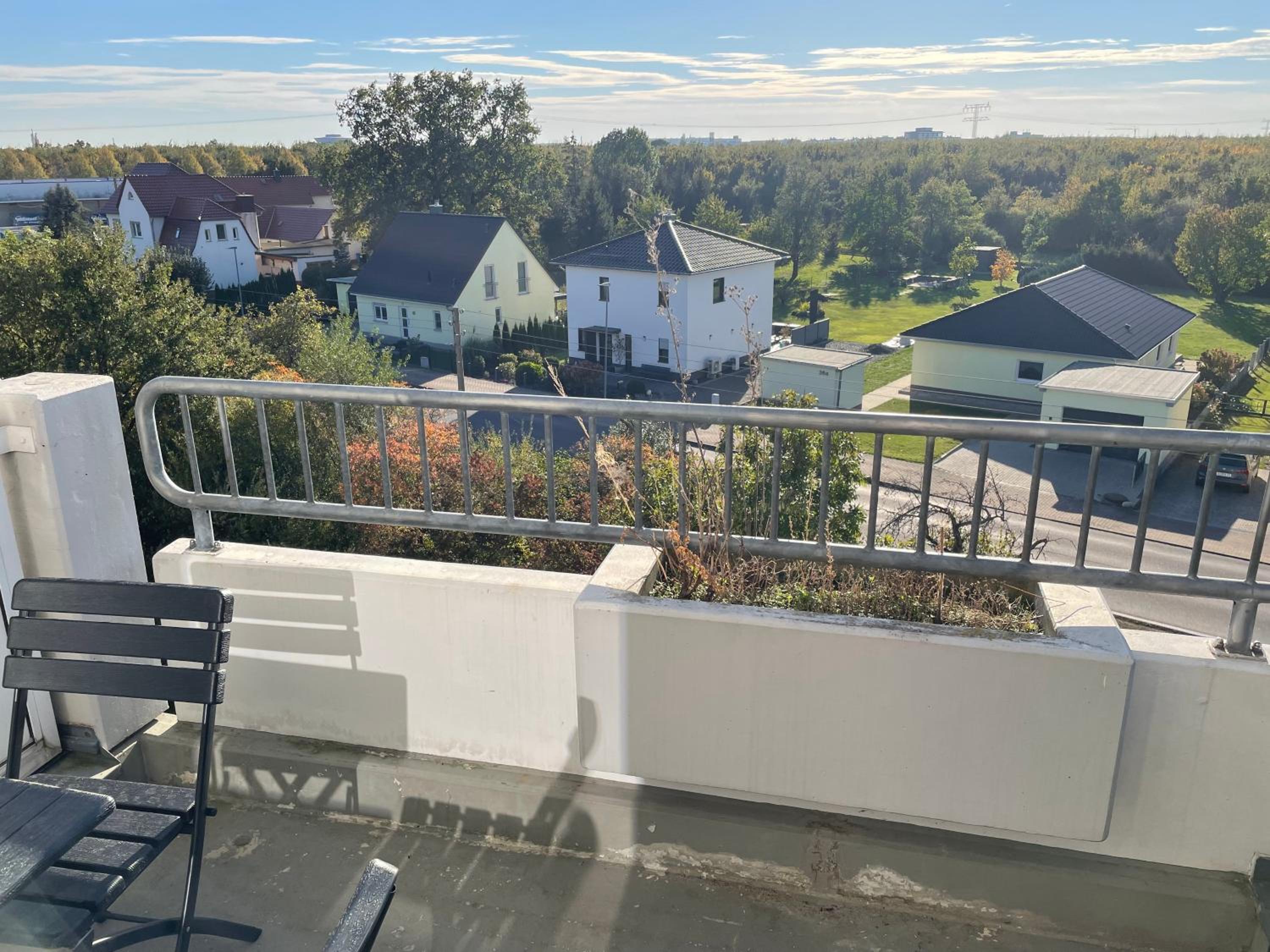Three-Bedroom Apartment with Balcony photo 2