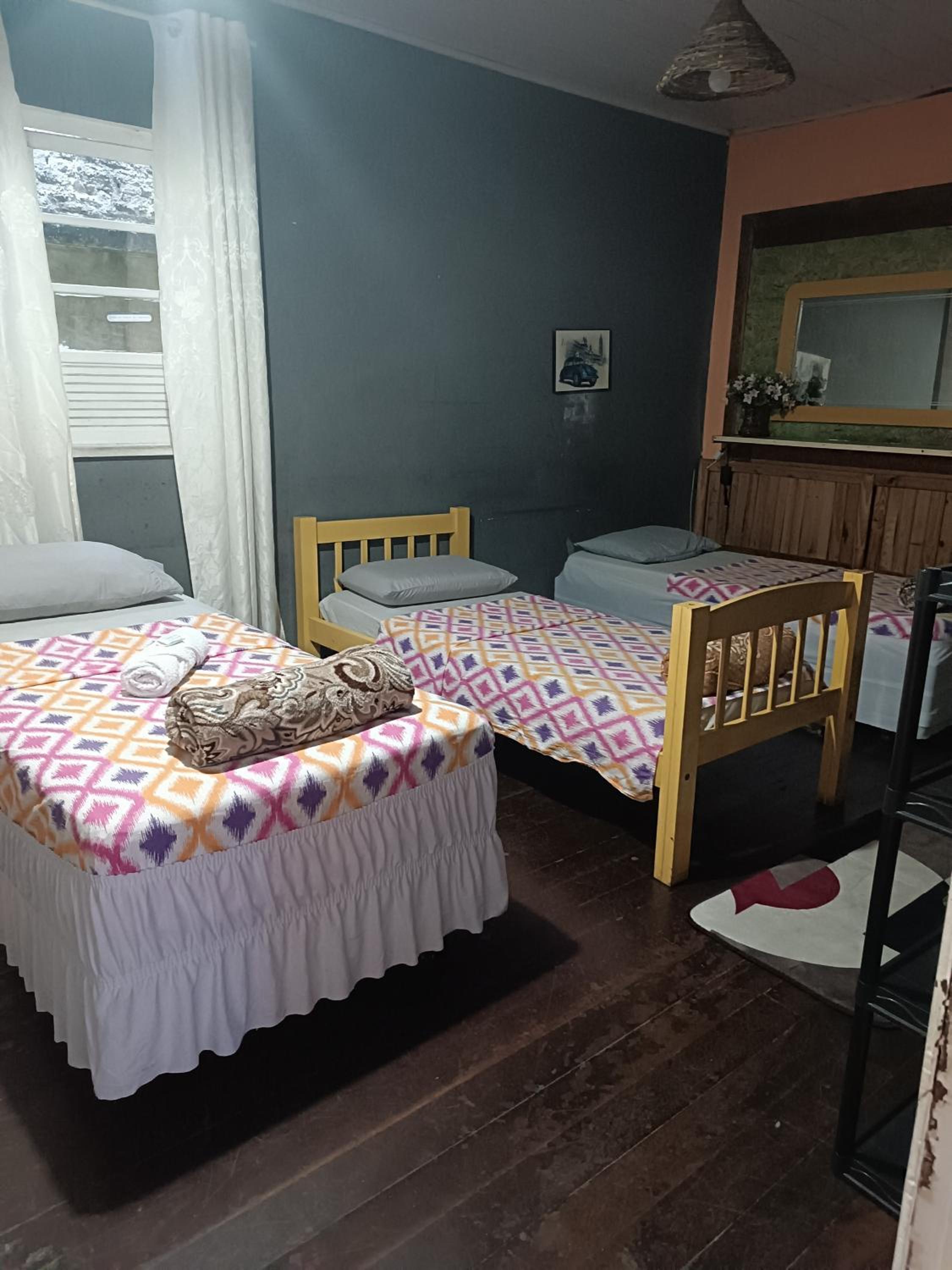 Basic Triple Room With Shared Bathroom photo 1
