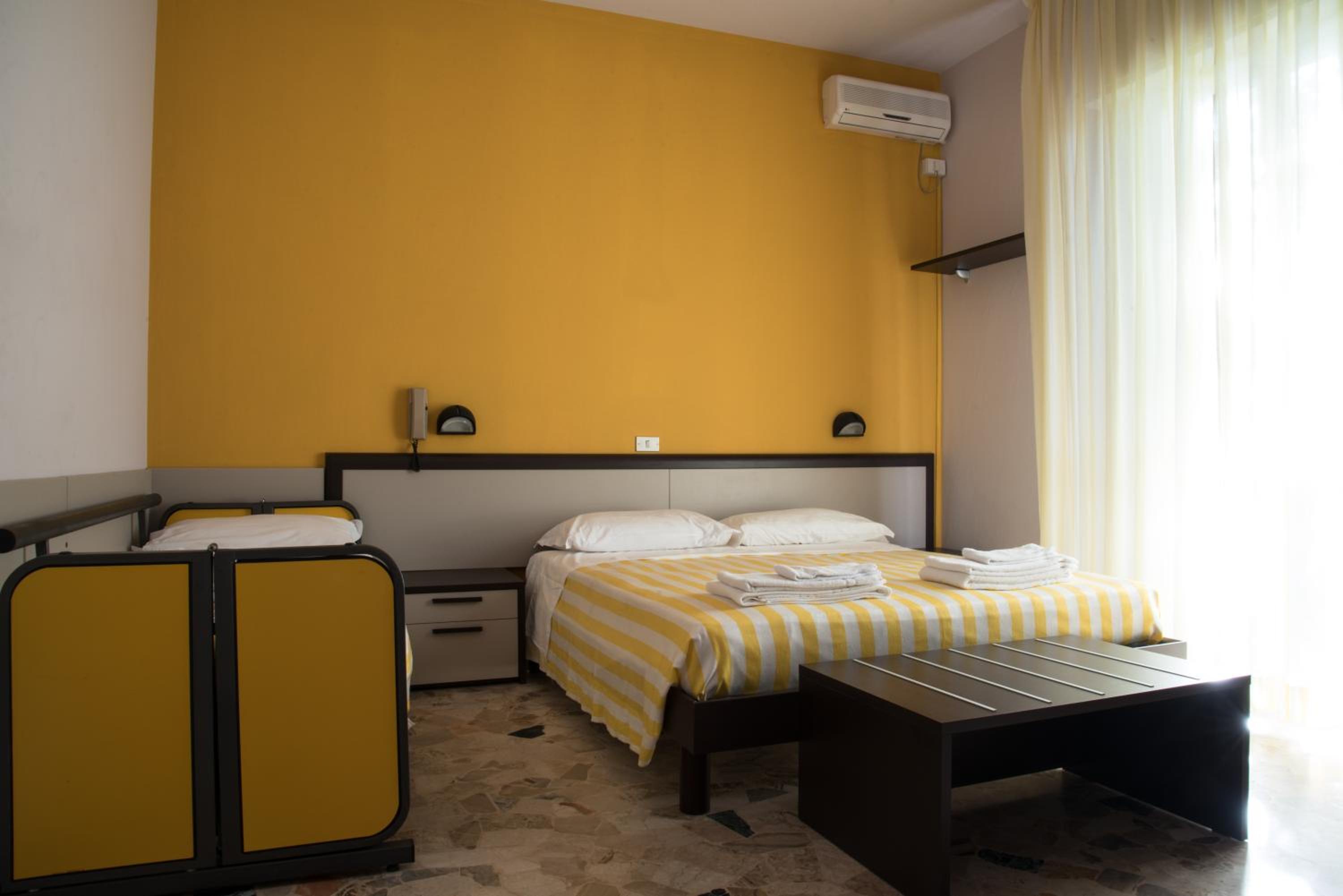 Economy Triple Room - Beach access photo 1