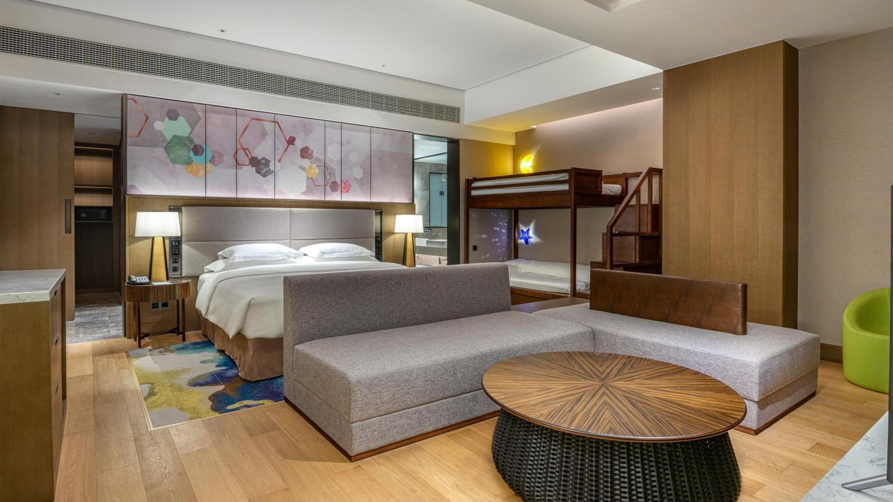 Premium Room with One King and One Bunk Bed - Photo 3