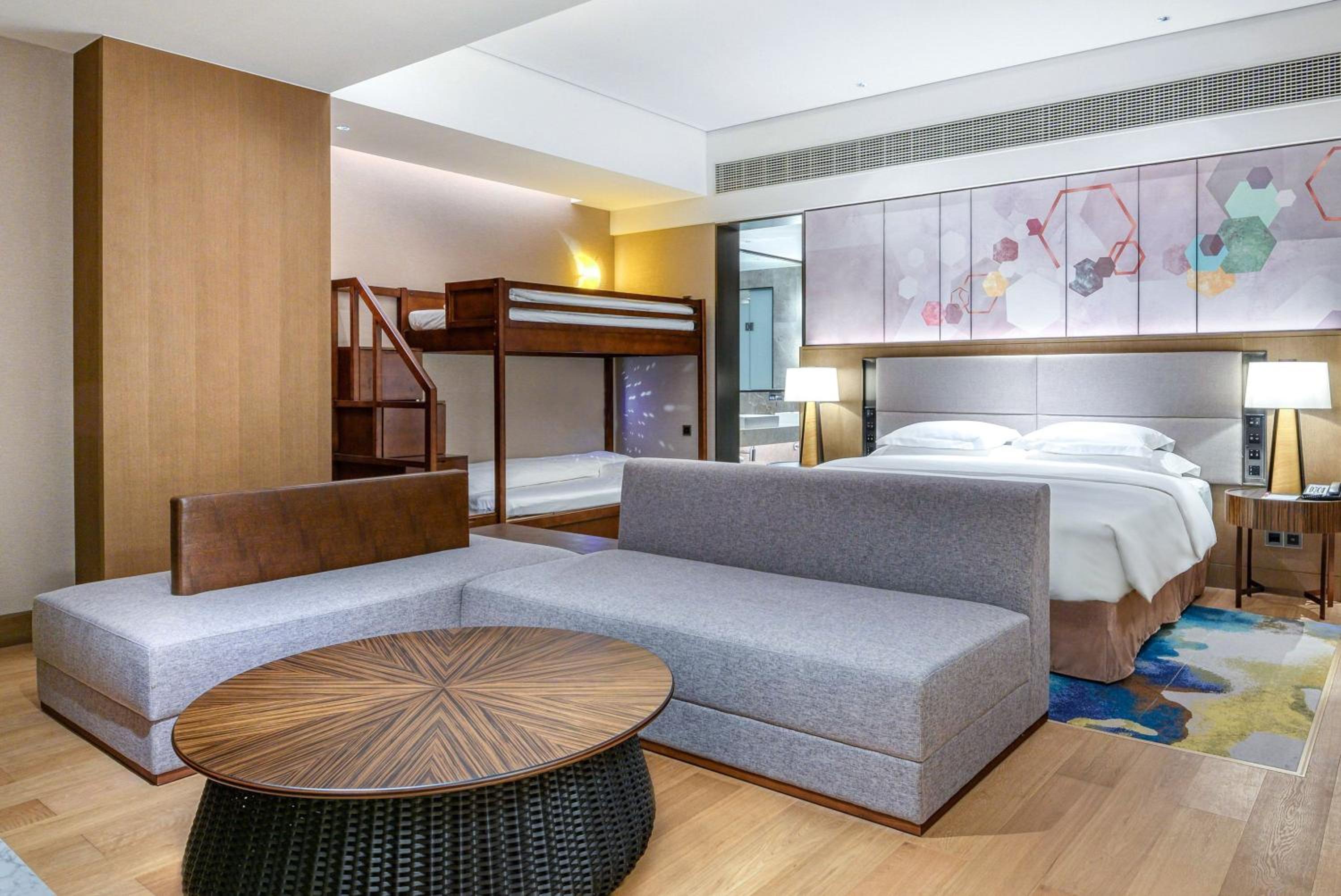 Premium Room with One King and One Bunk Bed - Photo 4