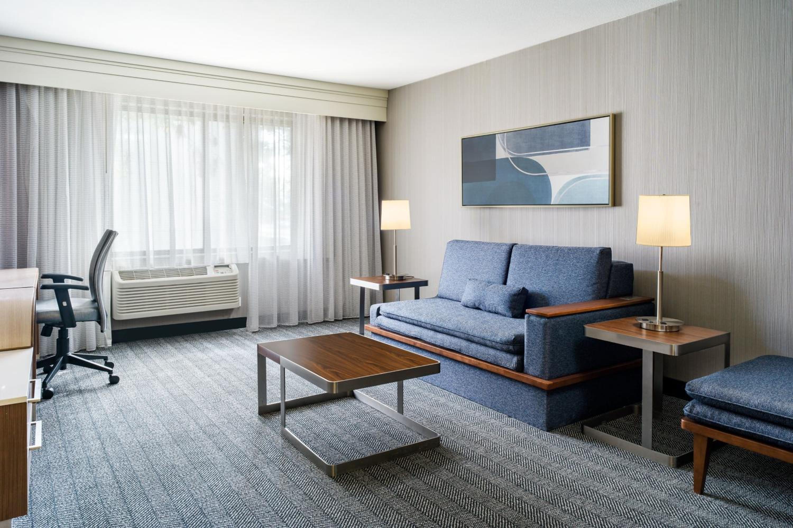King Suite with Sofa Bed and Adapted Tub - Mobility and Hearing Accessible - Photo 8