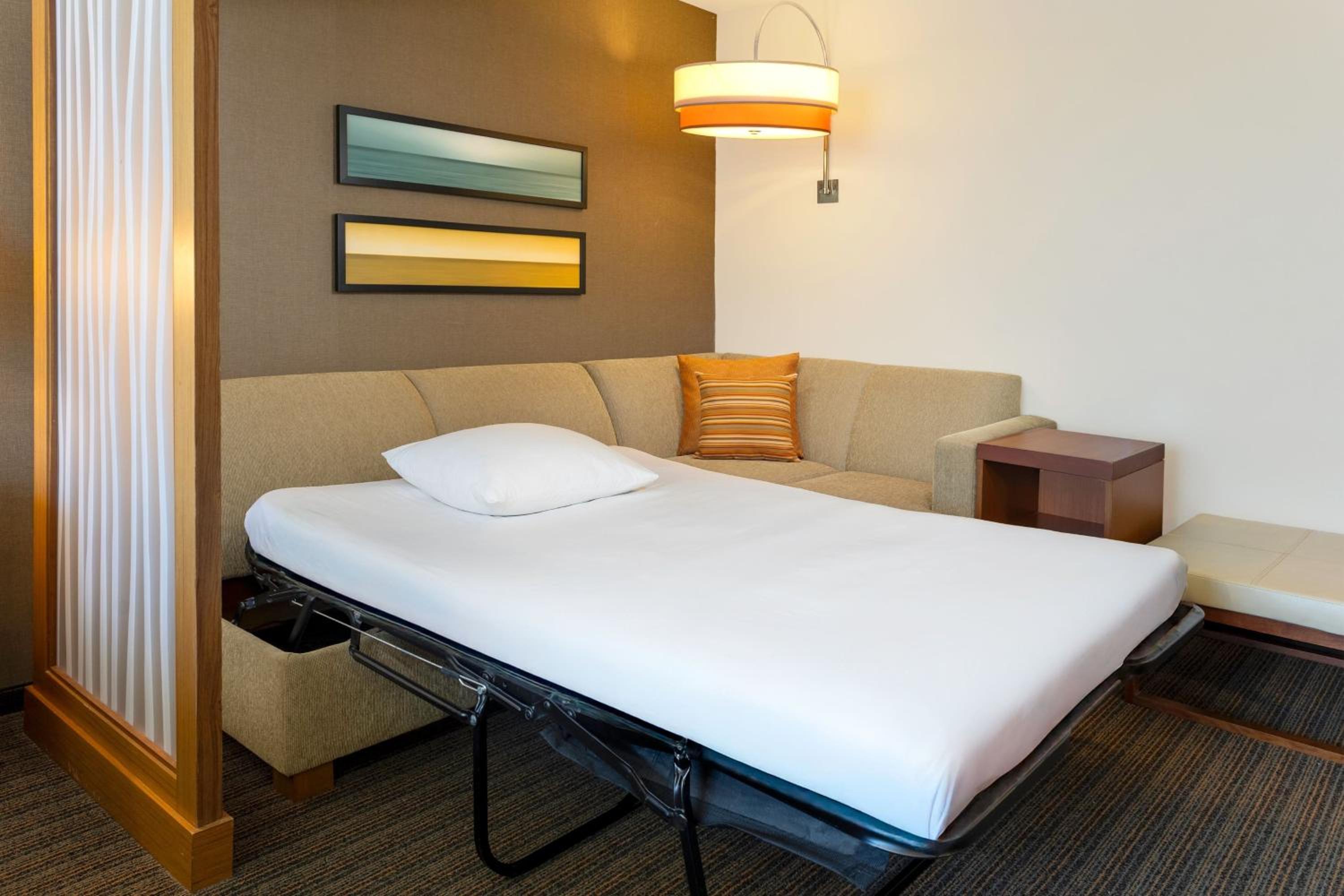 Queen Room with Two Queen Beds with Sofa Bed and City View photo 1