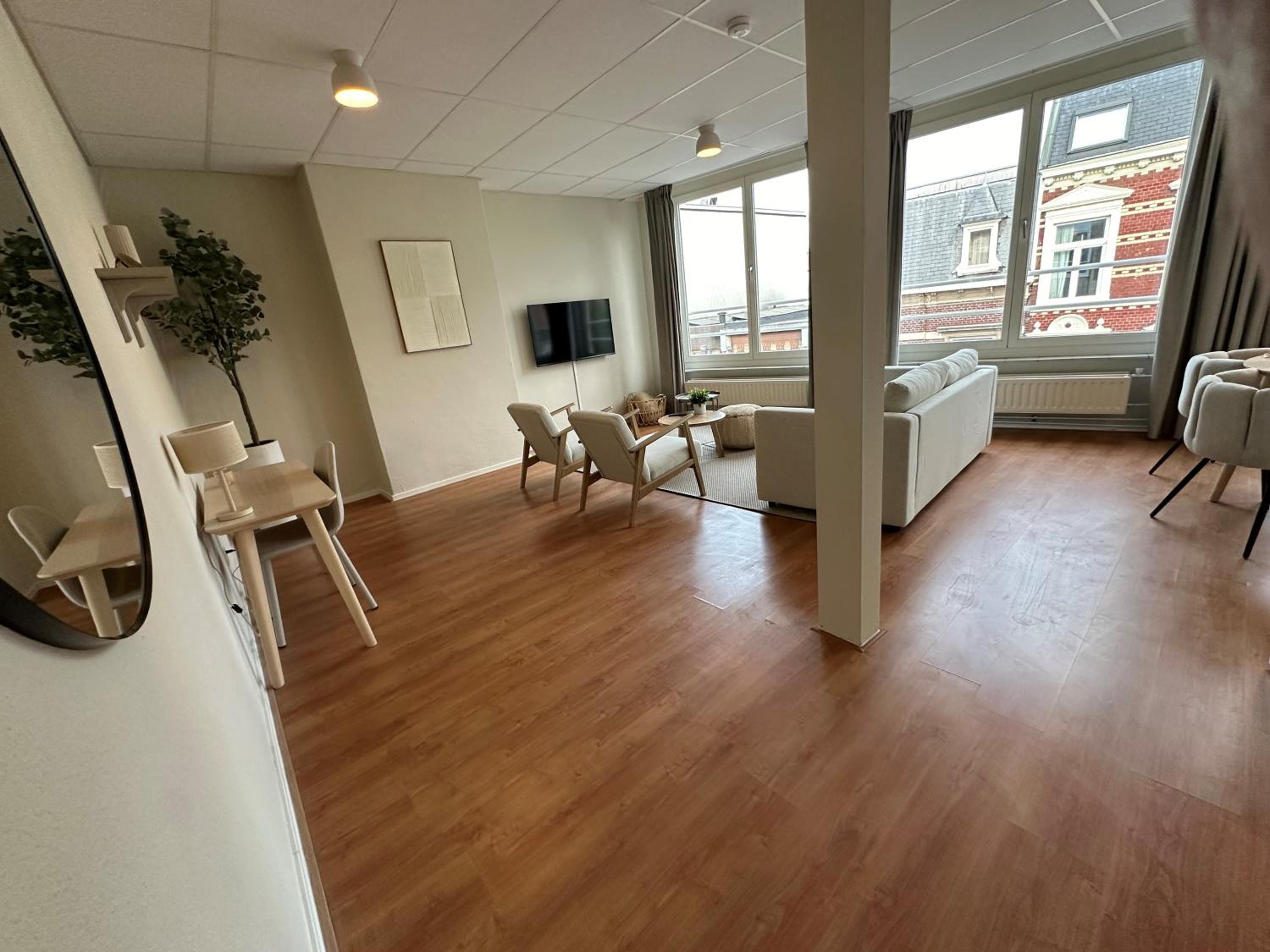 One-Bedroom Apartment with Balcony and City View