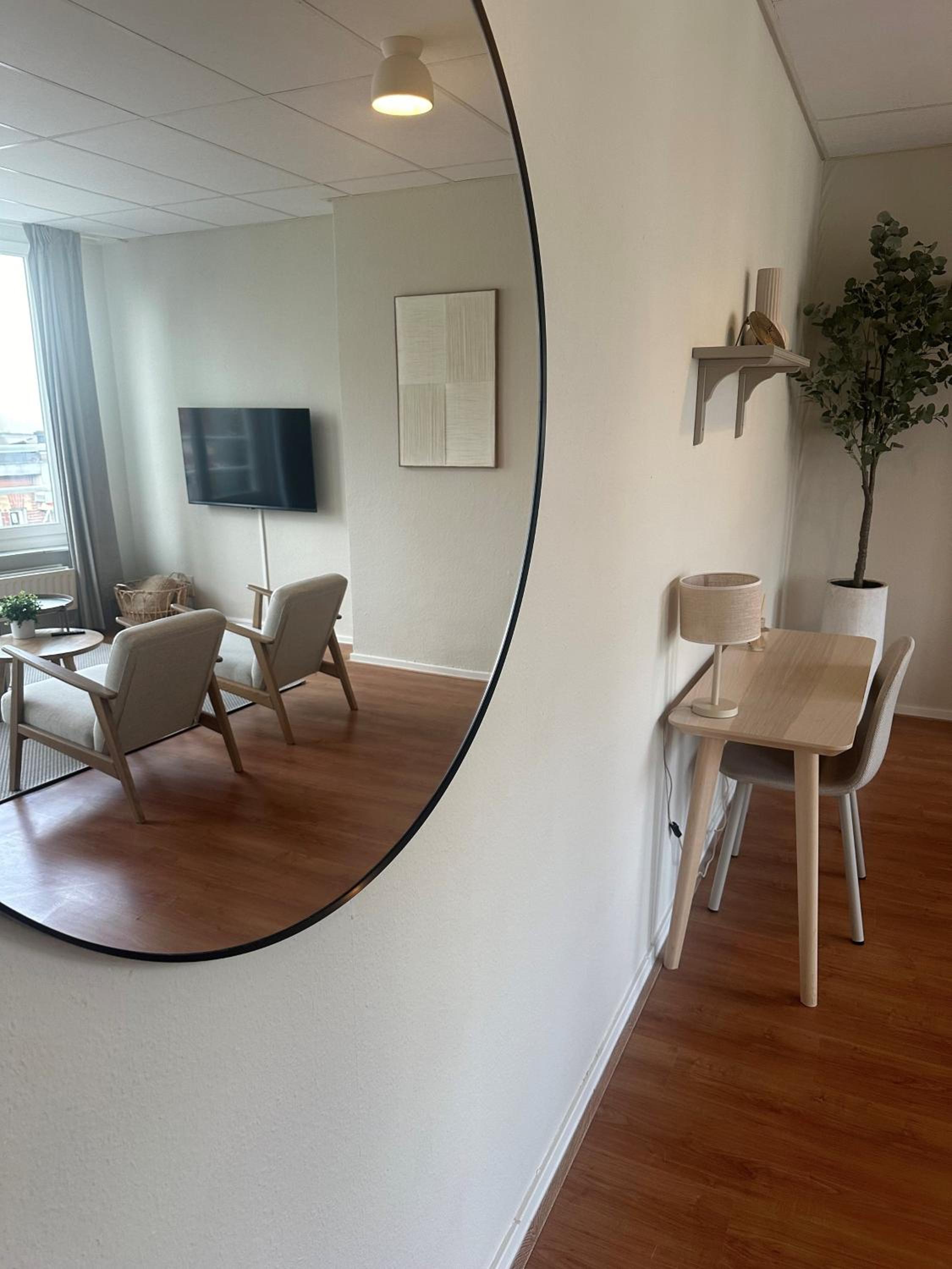 One-Bedroom Apartment with Balcony and City View photo 2