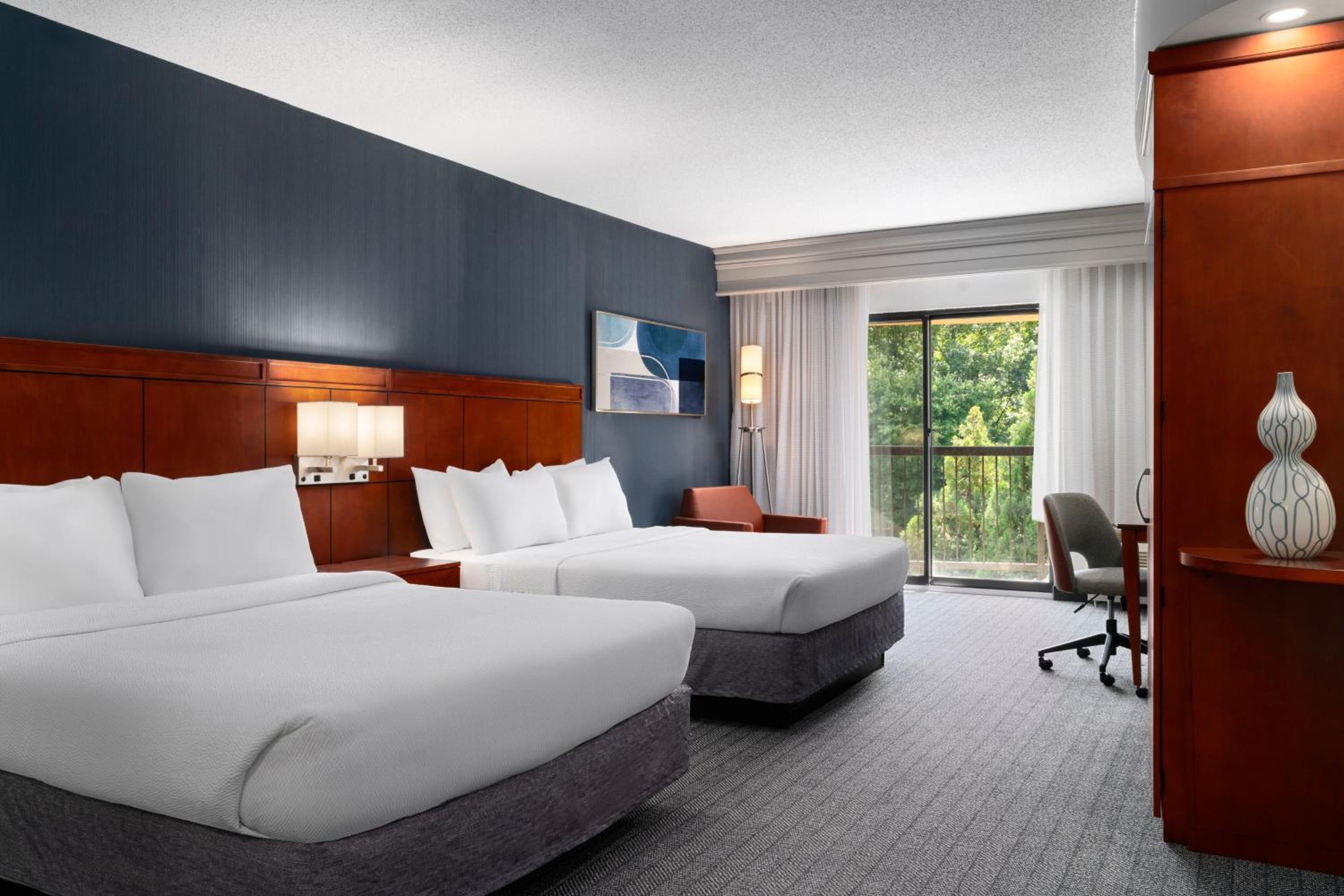 Queen Room with Two Queen Beds - Photo 1