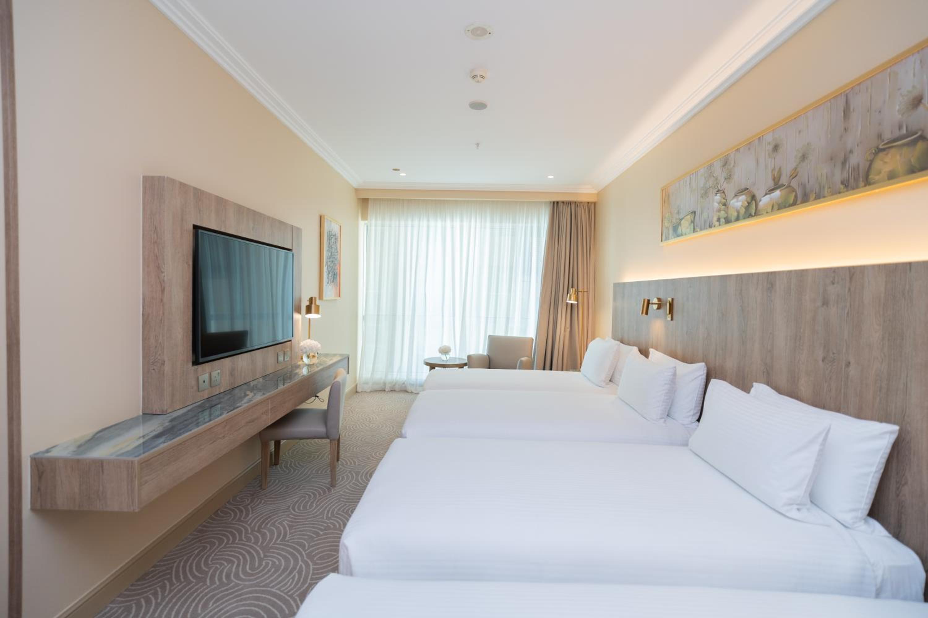 Classic Room with Four Single Beds and Partial Haram View