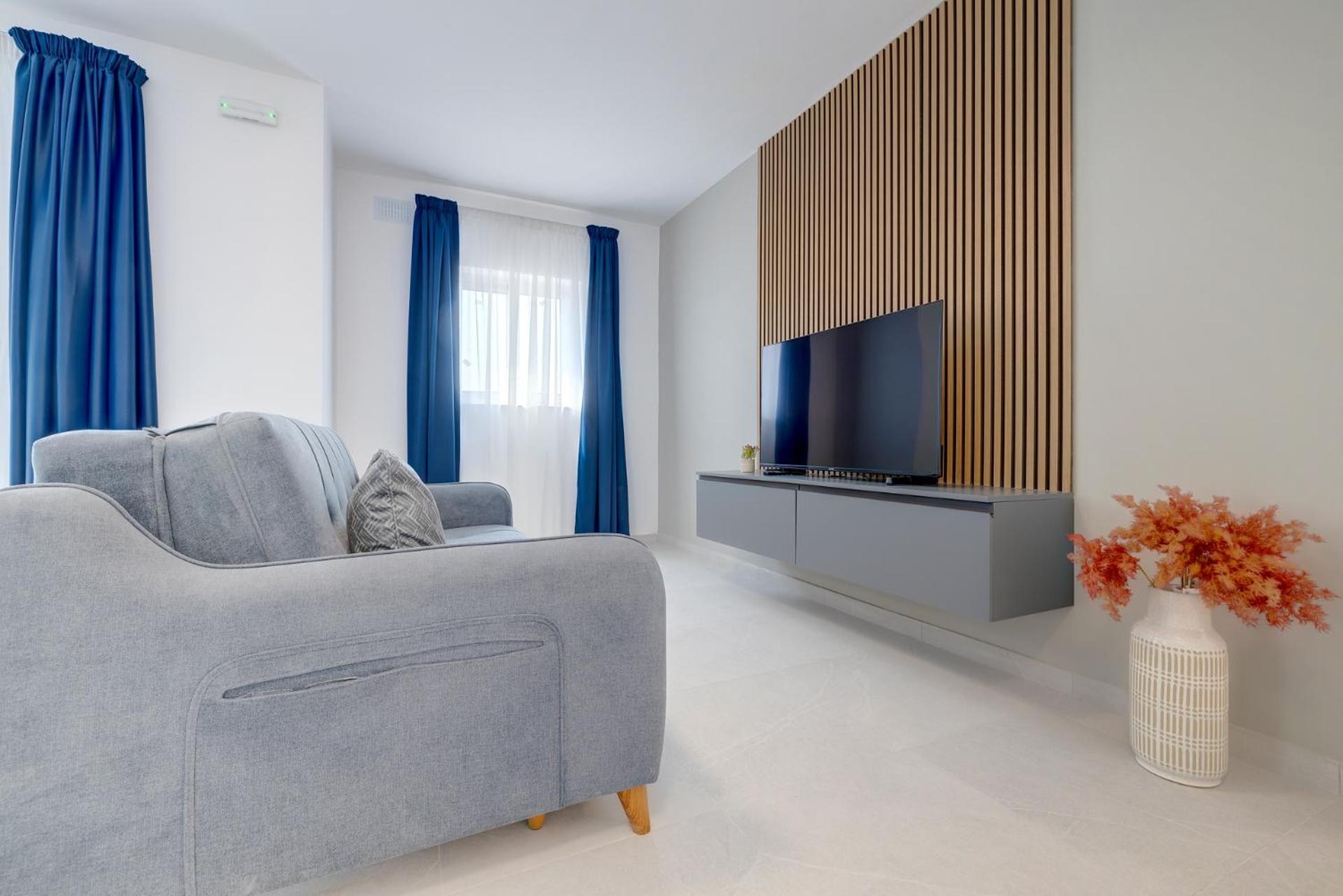 Three-Bedroom Apartment with Balcony