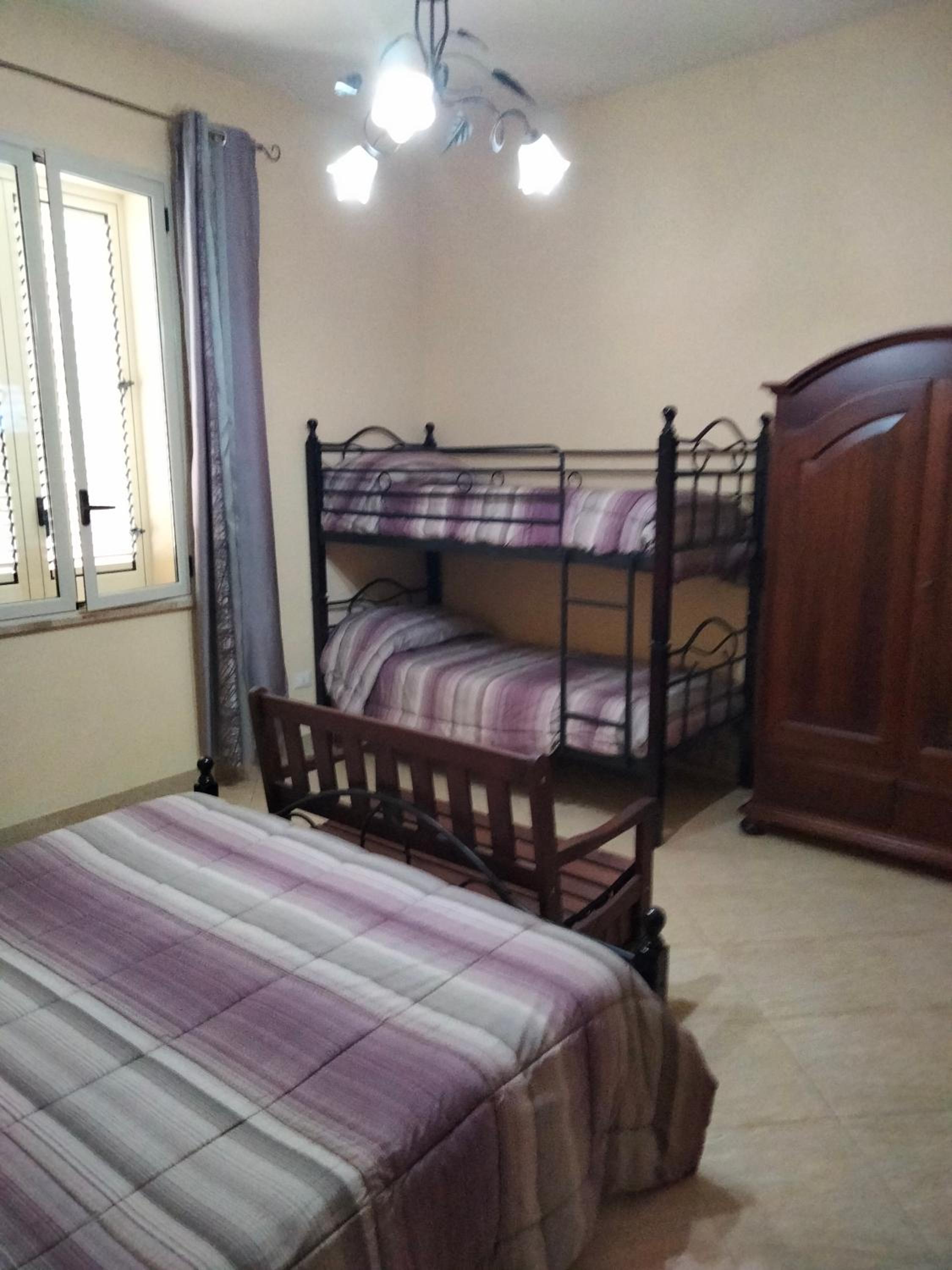 Quadruple Room - Photo 7