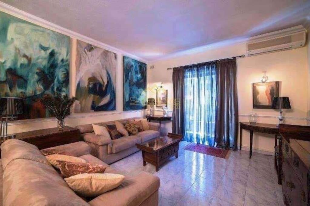 Four-Bedroom Apartment with Balcony 