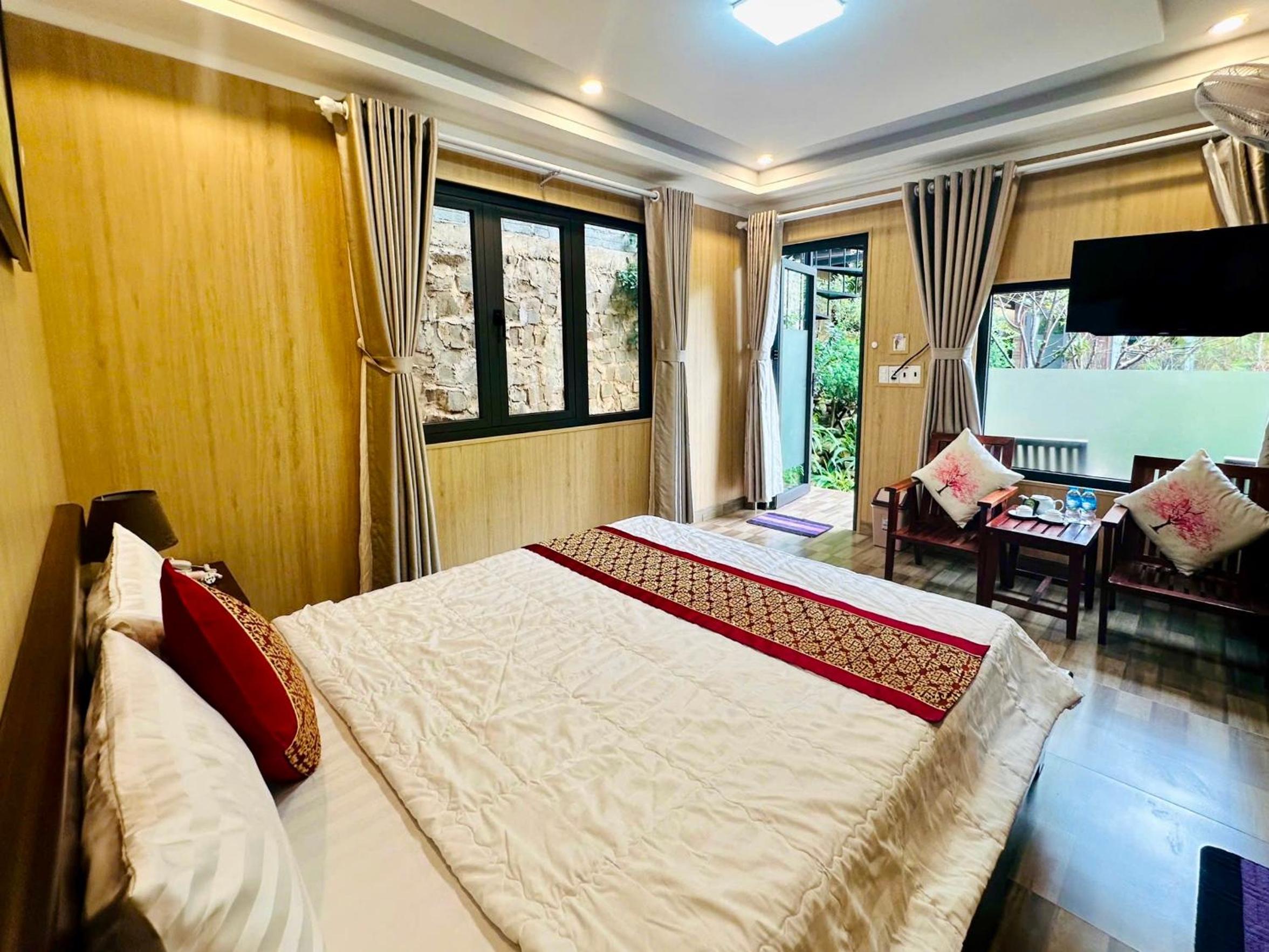 Queen Room with Garden View - Photo 1