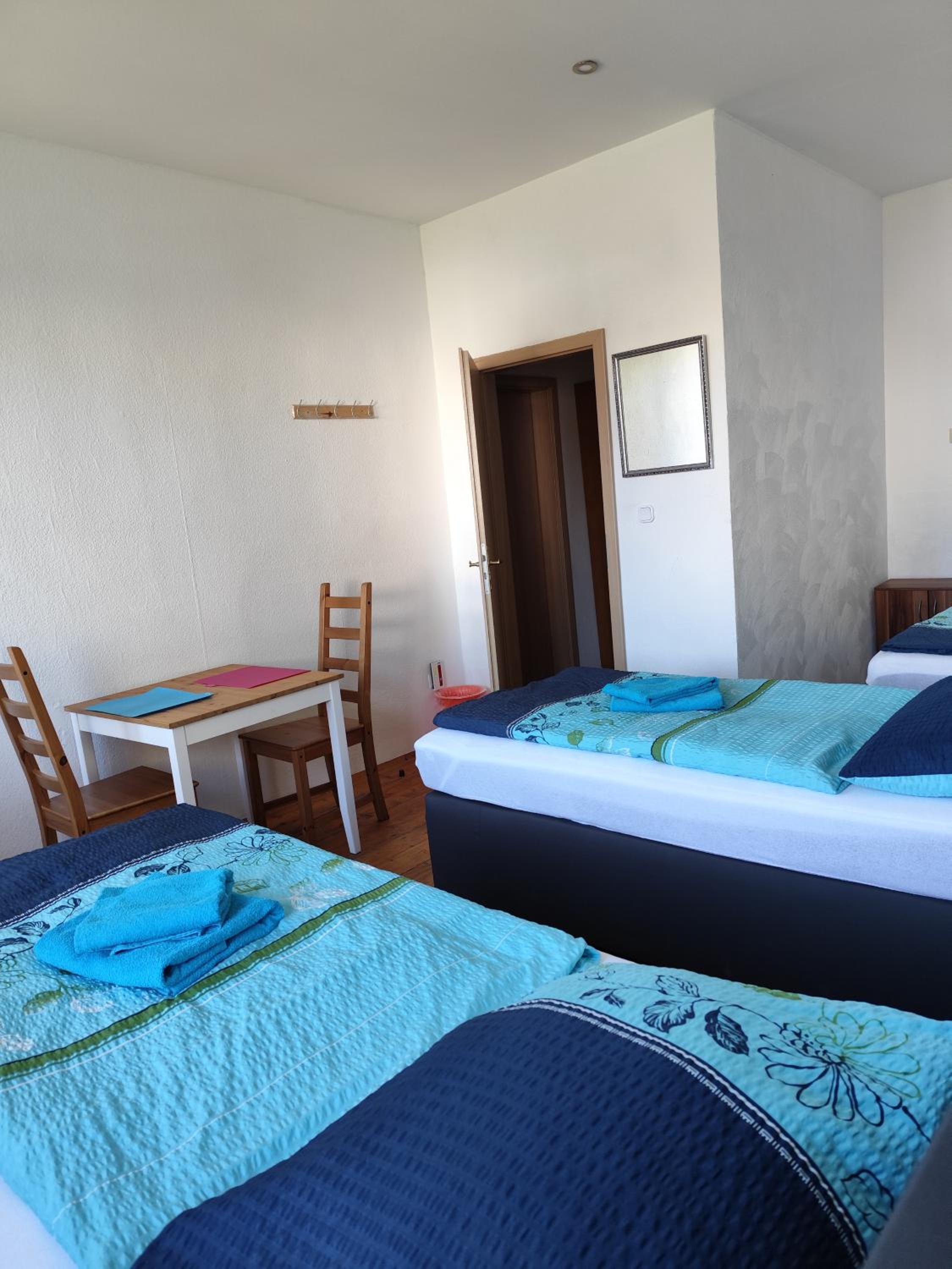 Triple Room with Shared Shower and Toilet photo 3