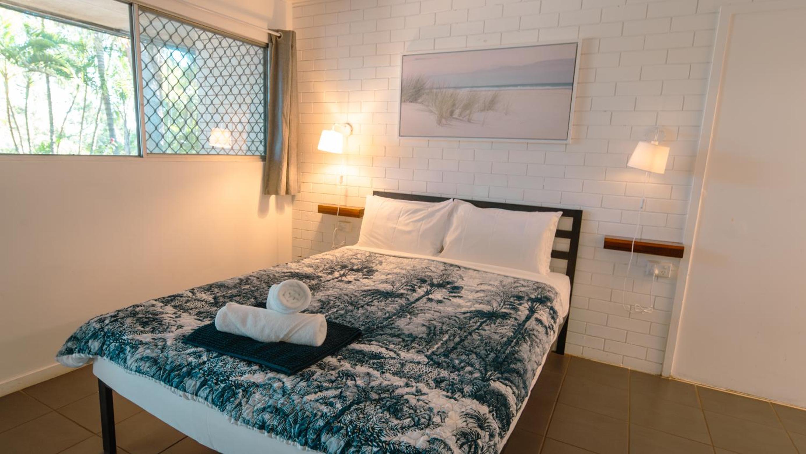 Deluxe Quadruple Room - Photo 11