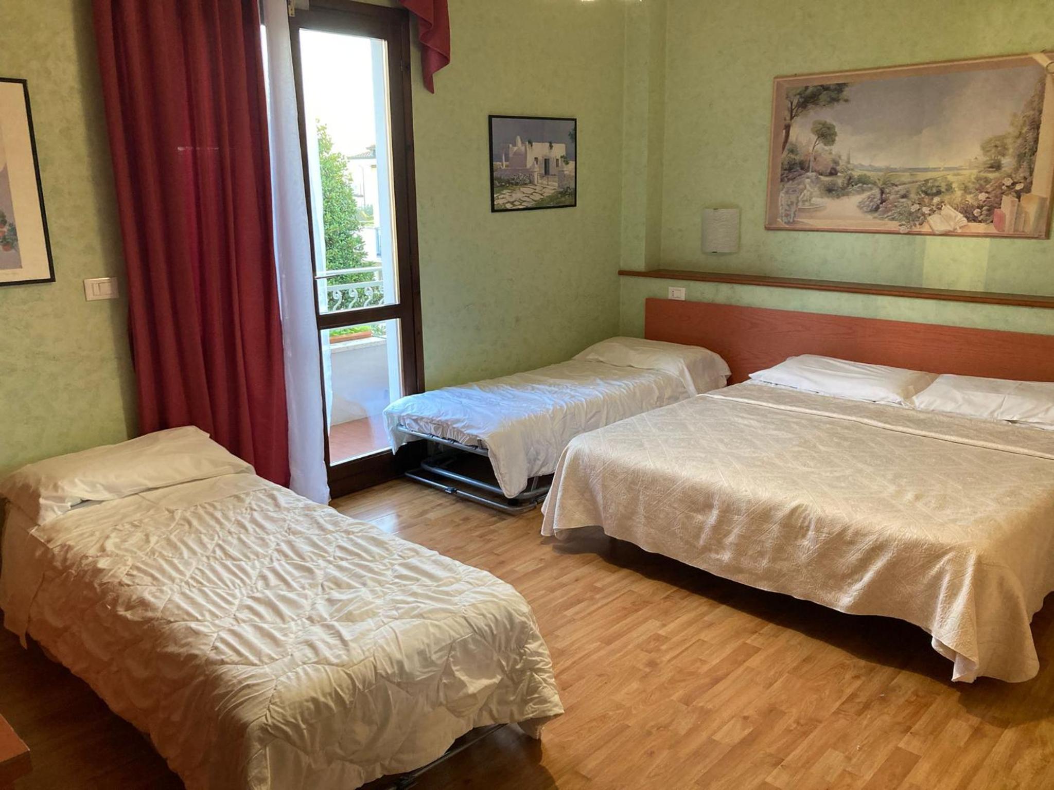 Quadruple Room with Balcony photo 1