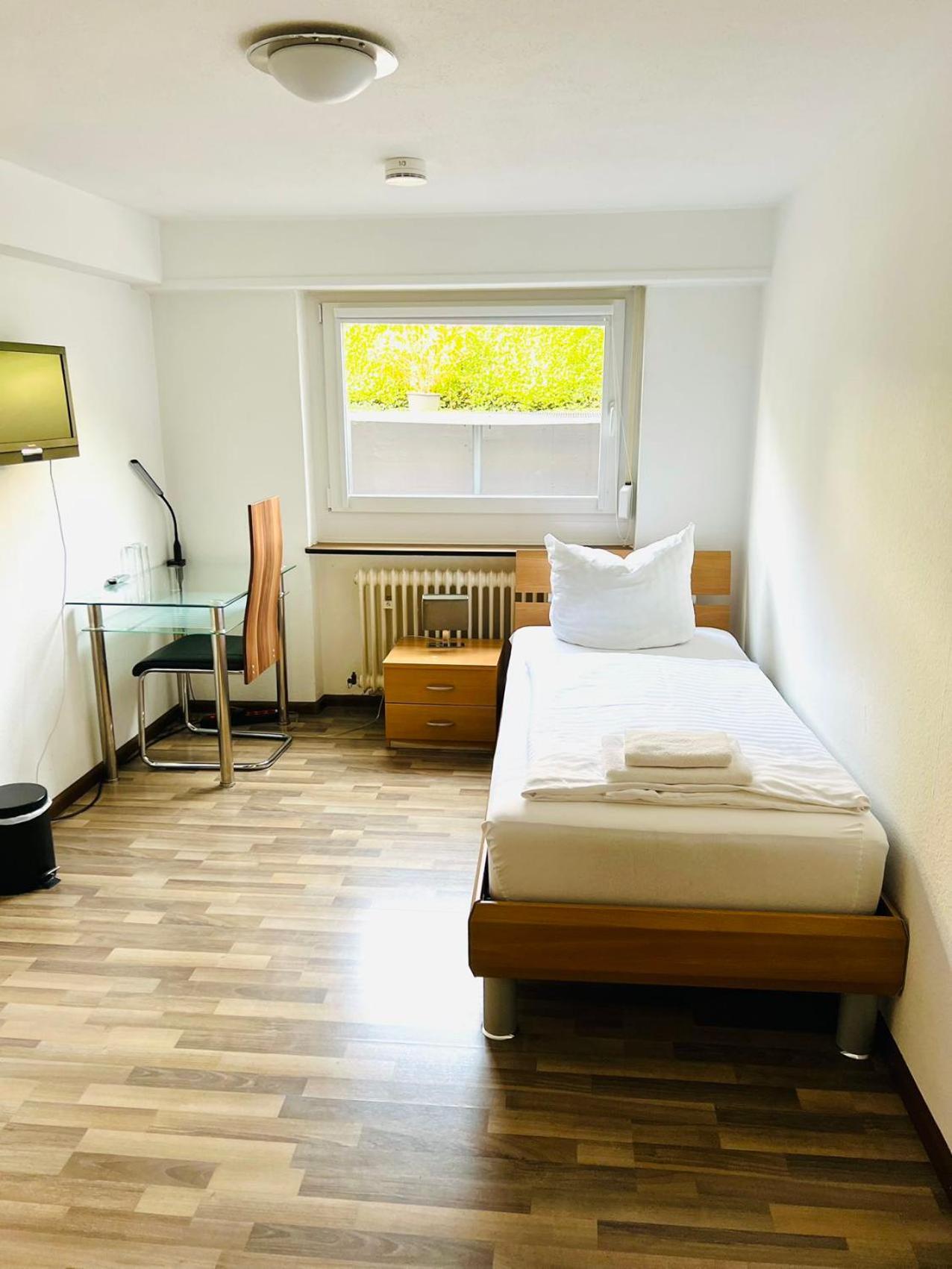 Single Room with Shared Shower and Toilet