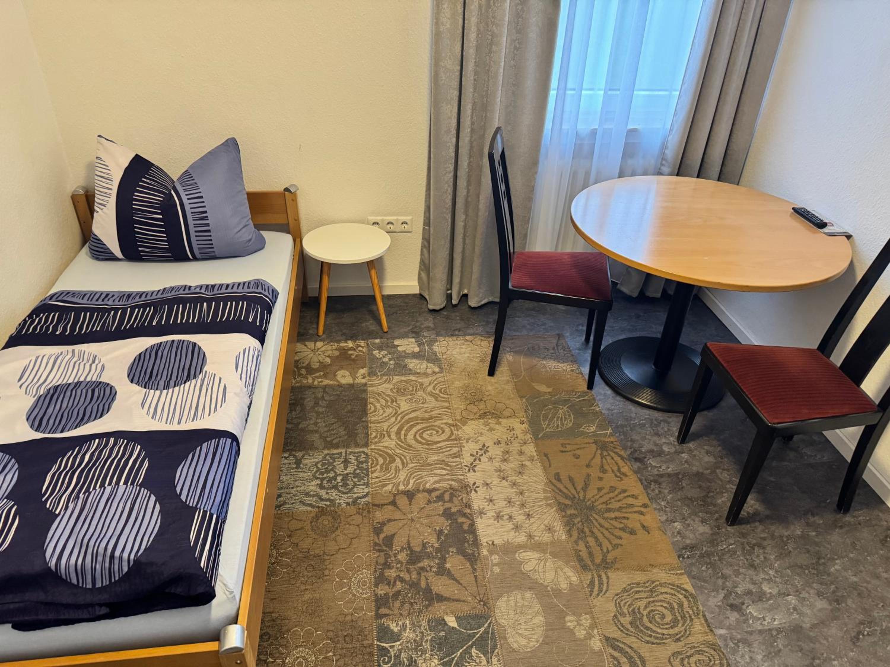 Single Room with Shared Toilet