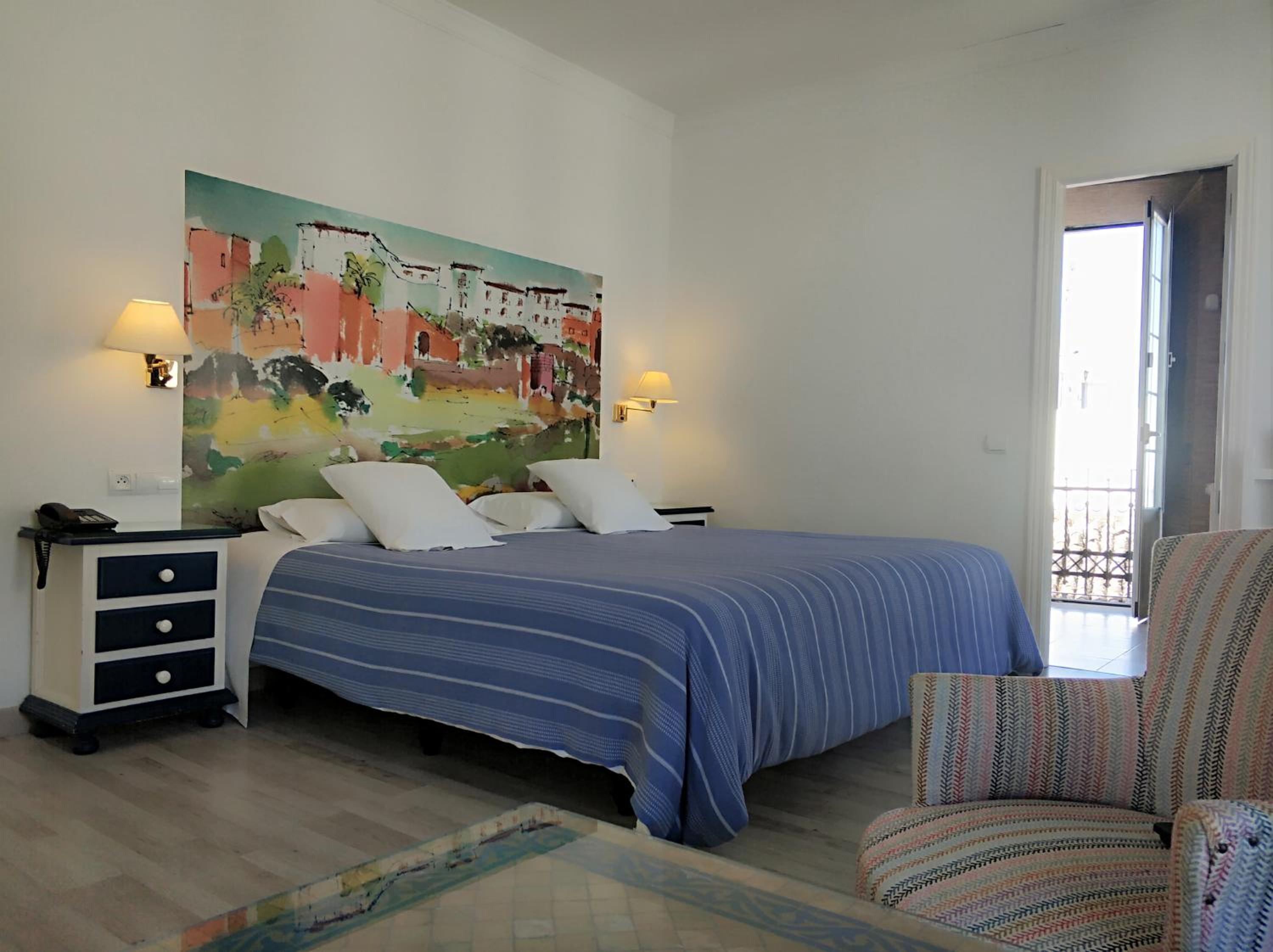 Habitación King con Balcón