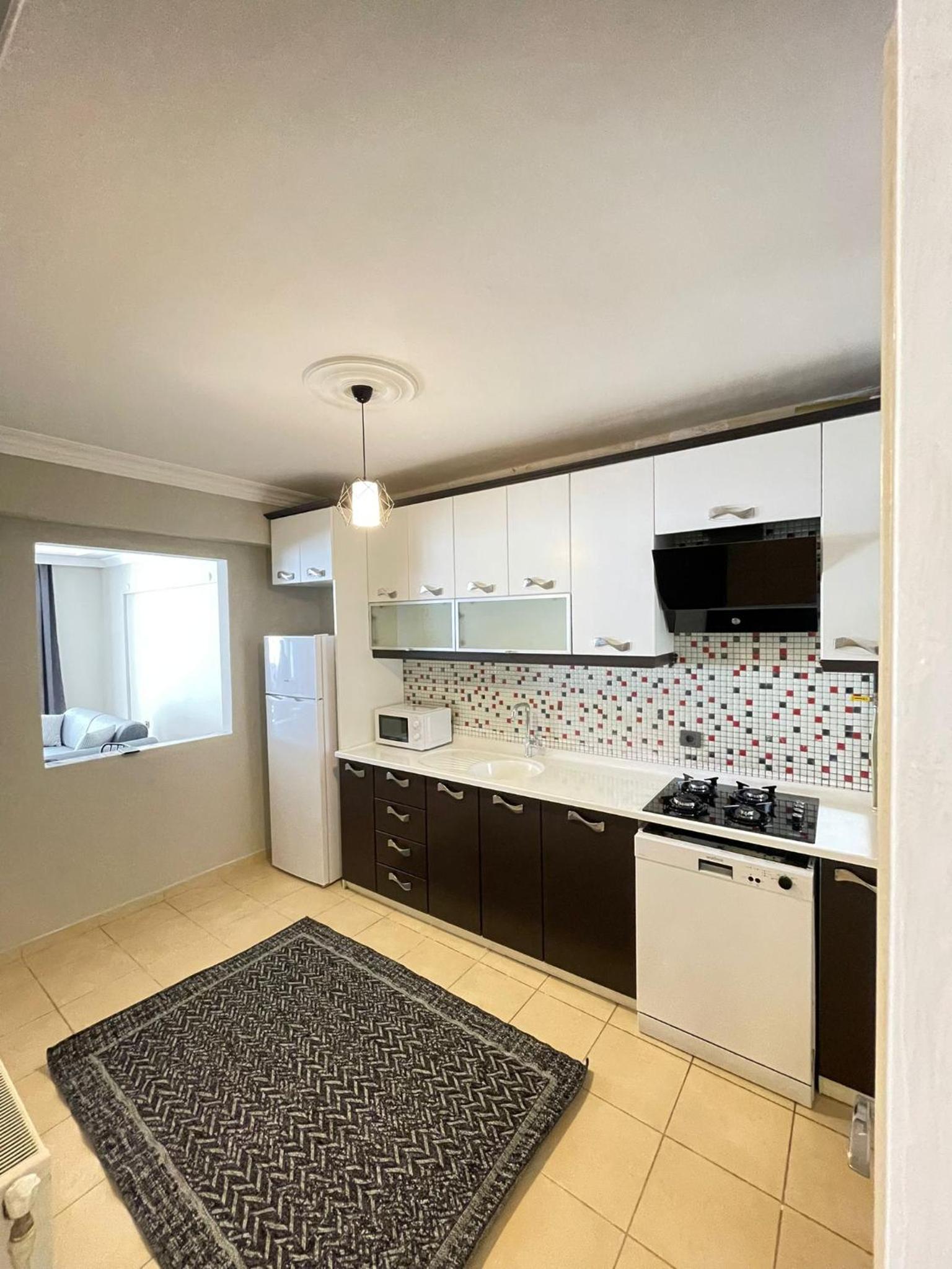 Three-Bedroom Apartment photo 2