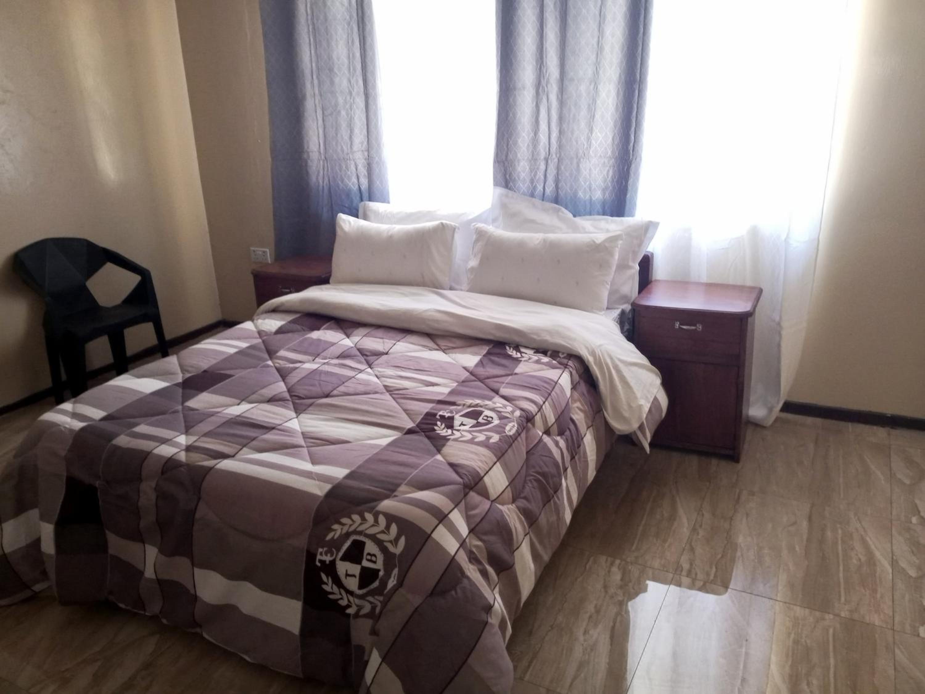 Deluxe Double Room (2 Adults + 1 Child) photo 3