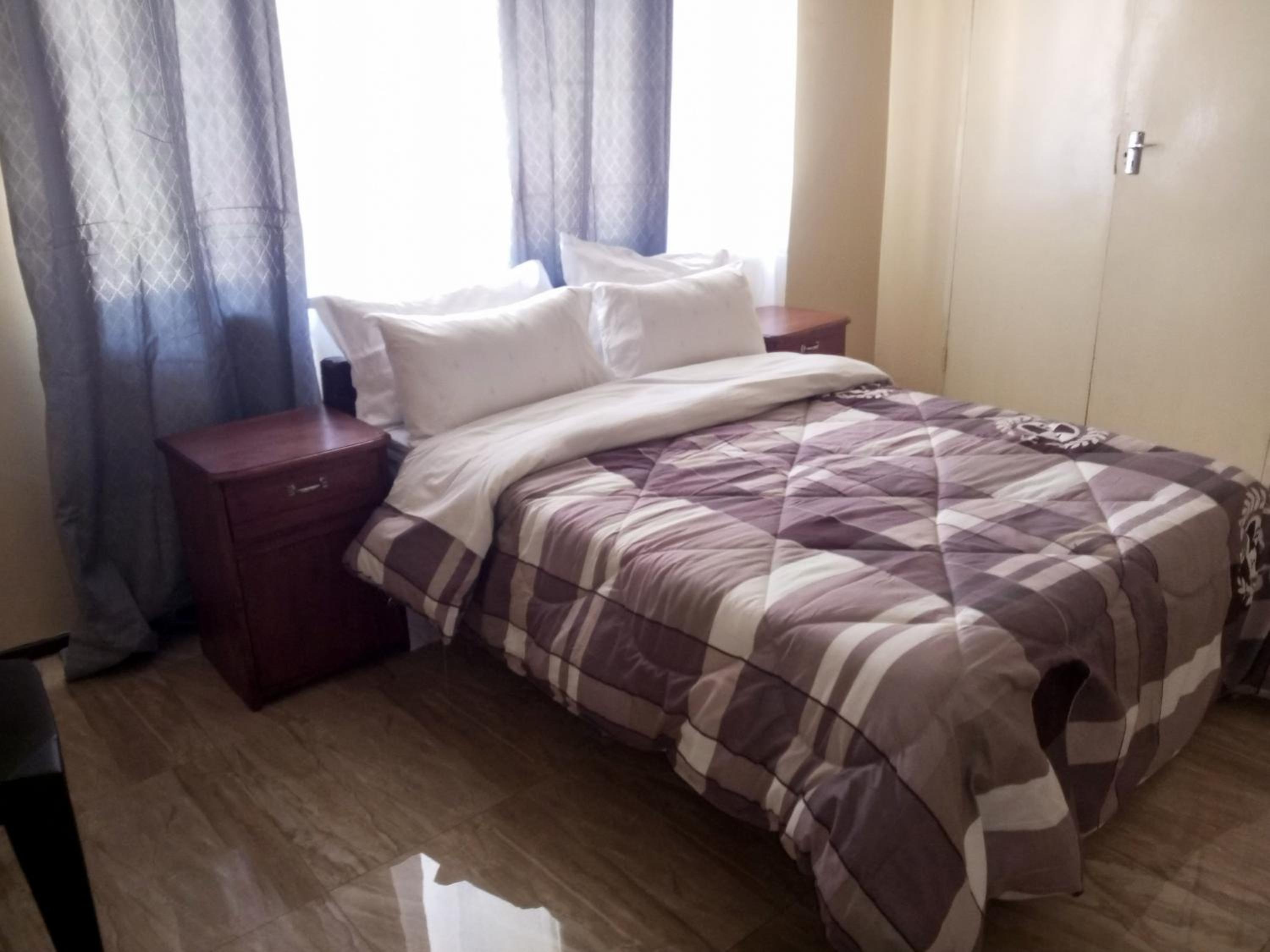 Deluxe Double Room (2 Adults + 1 Child) photo 2
