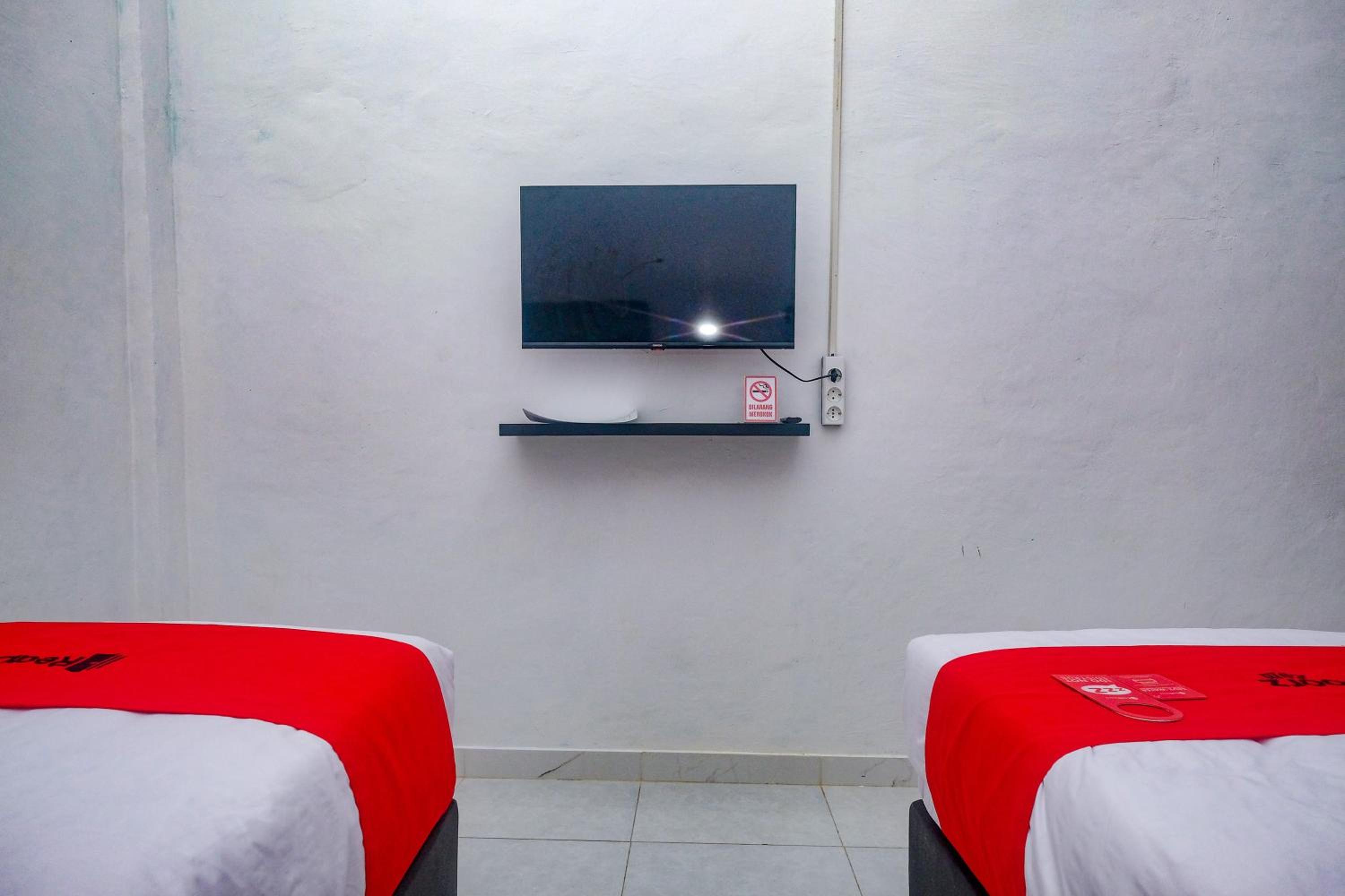 Standard Twin Room - Photo 11