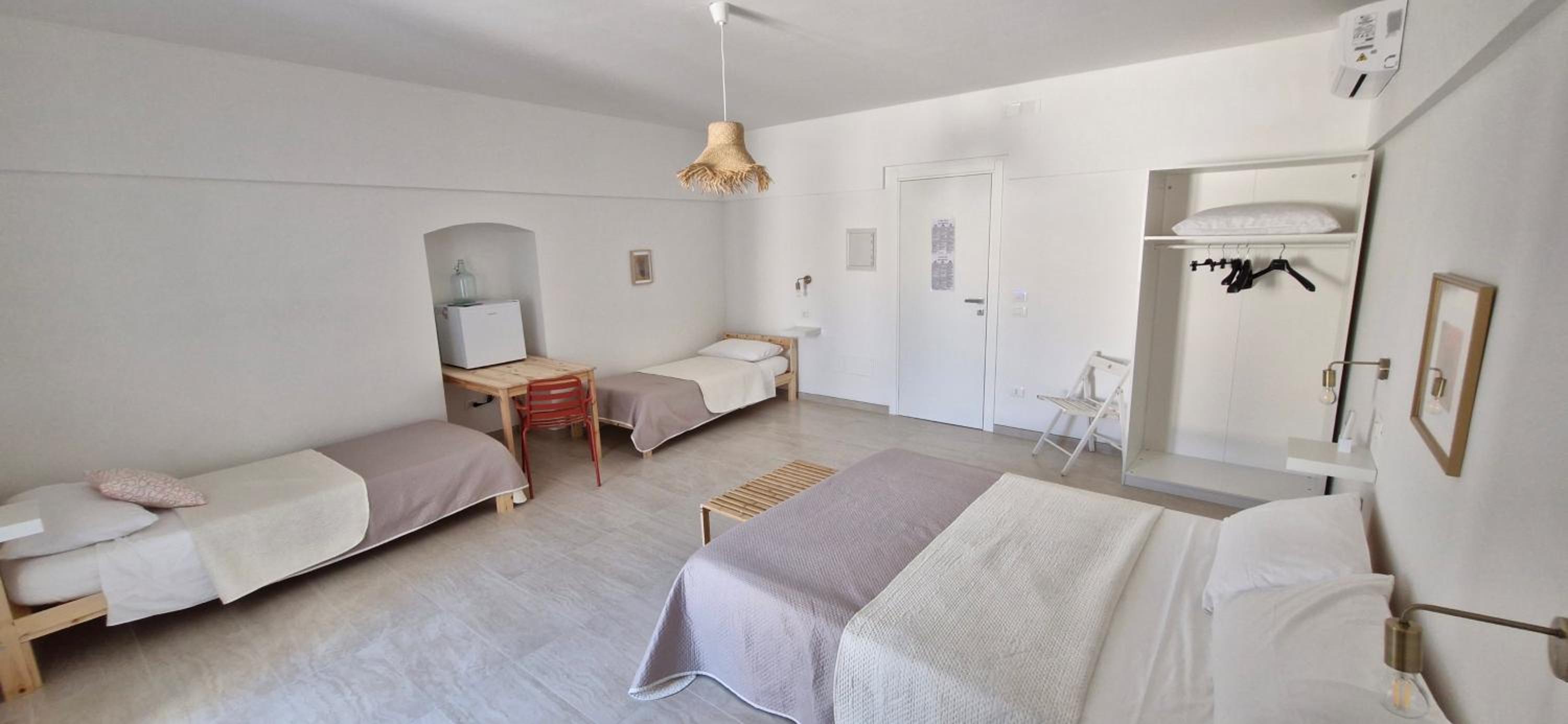 Quadruple Room with Private Bathroom photo 3