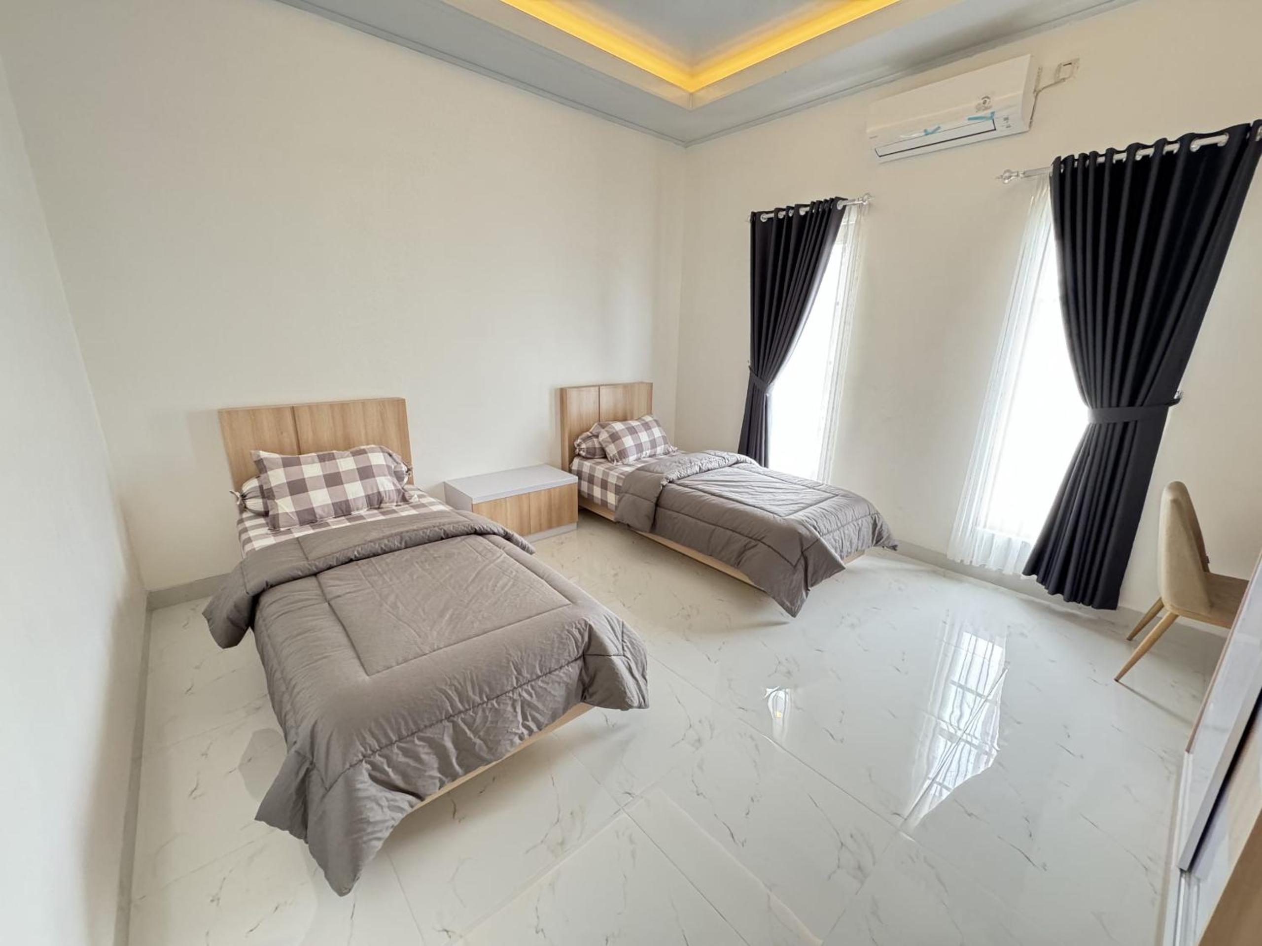 Three-Bedroom House photo 1