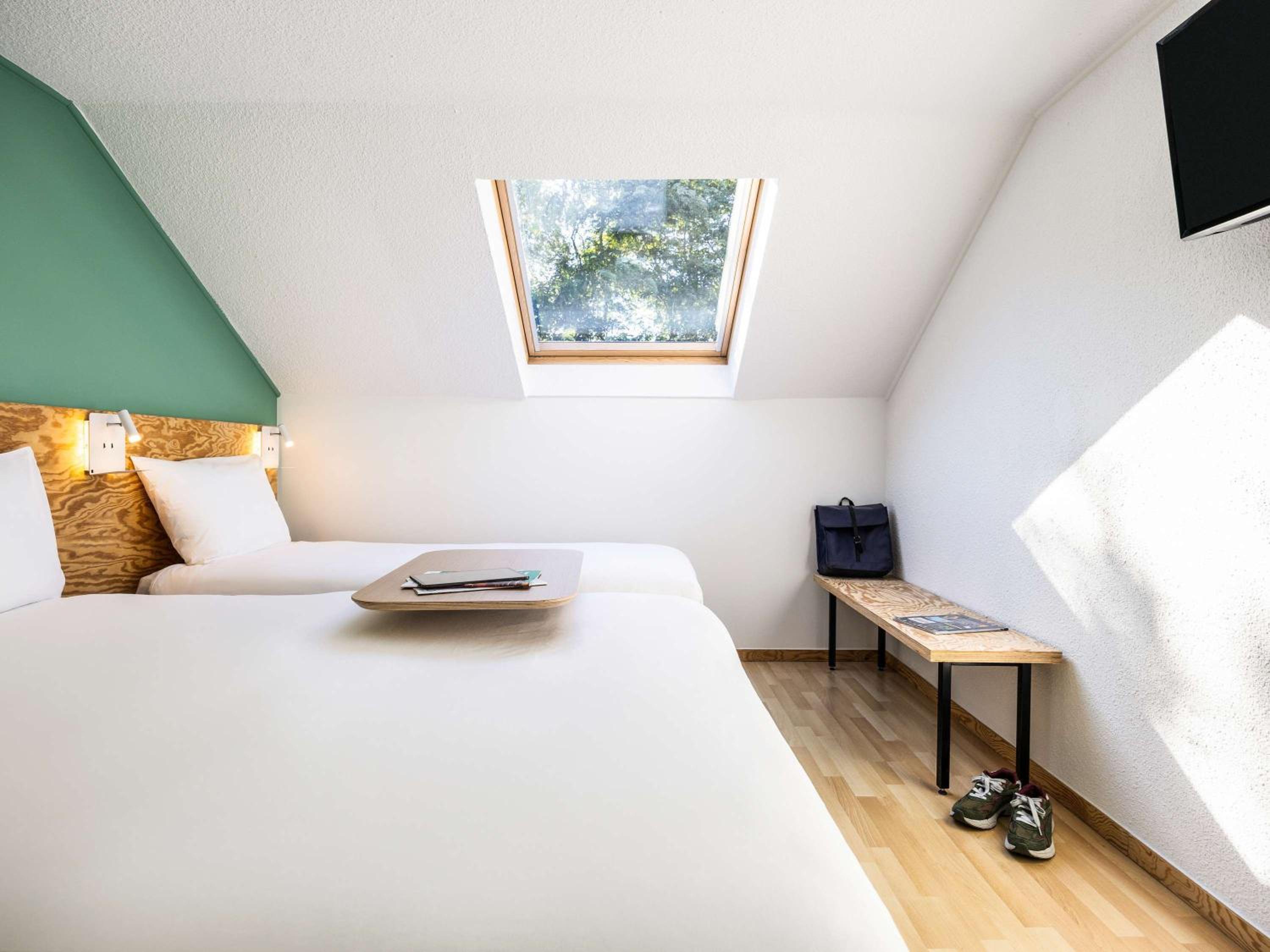 family room with one double and one single bed photo 1