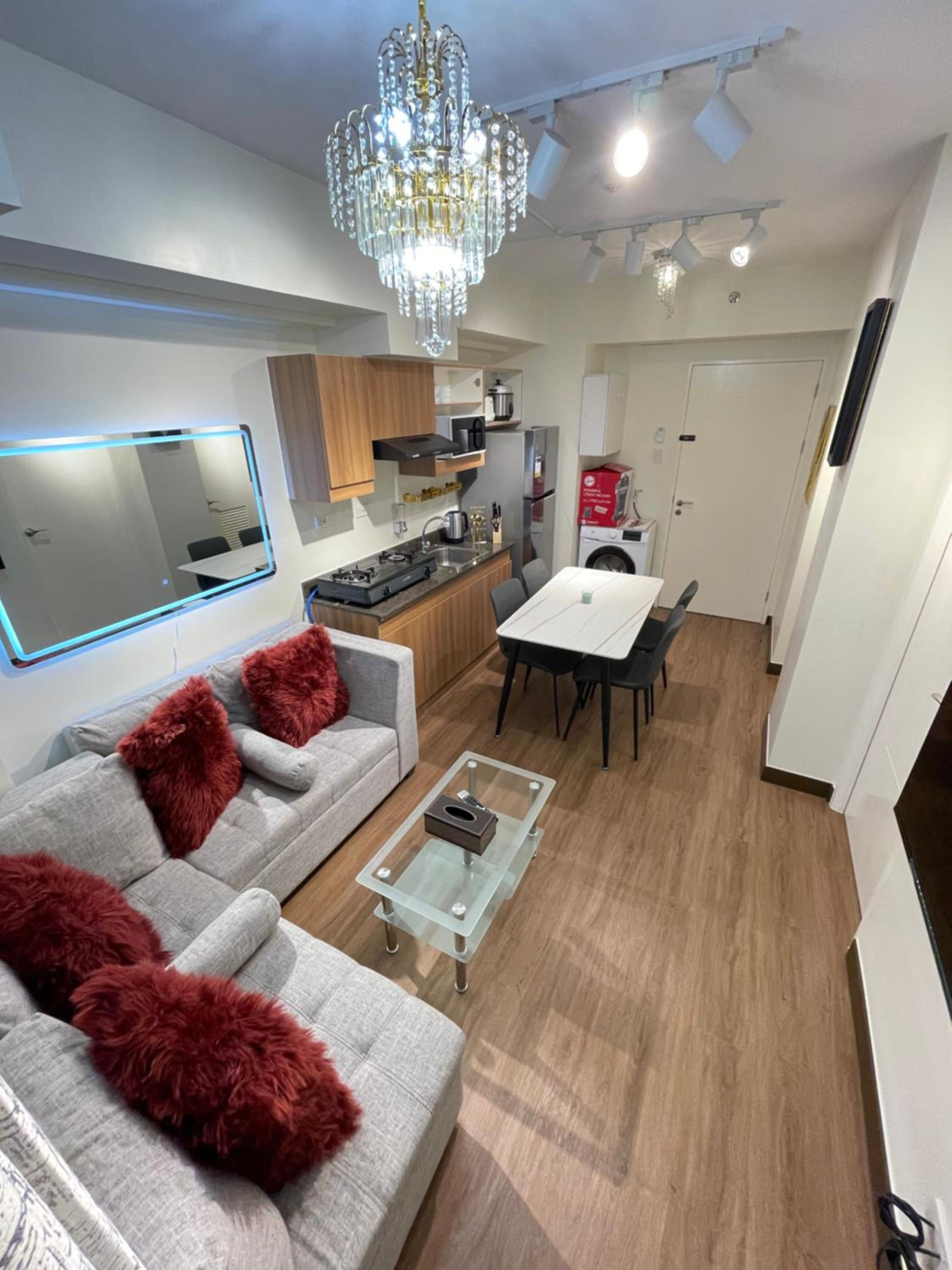 One-Bedroom Apartment with Balcony and City View