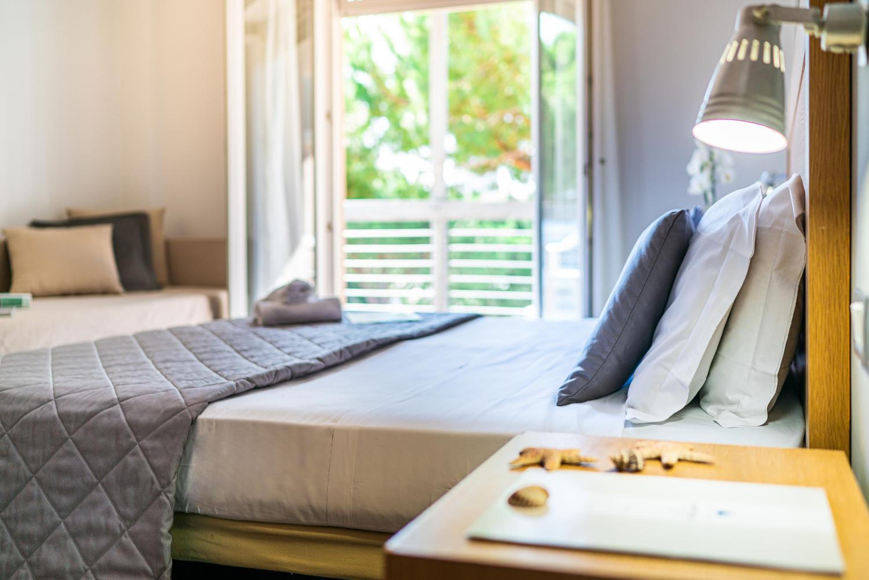 Double Room with Extra Bed, Balcony and Pool view photo 1