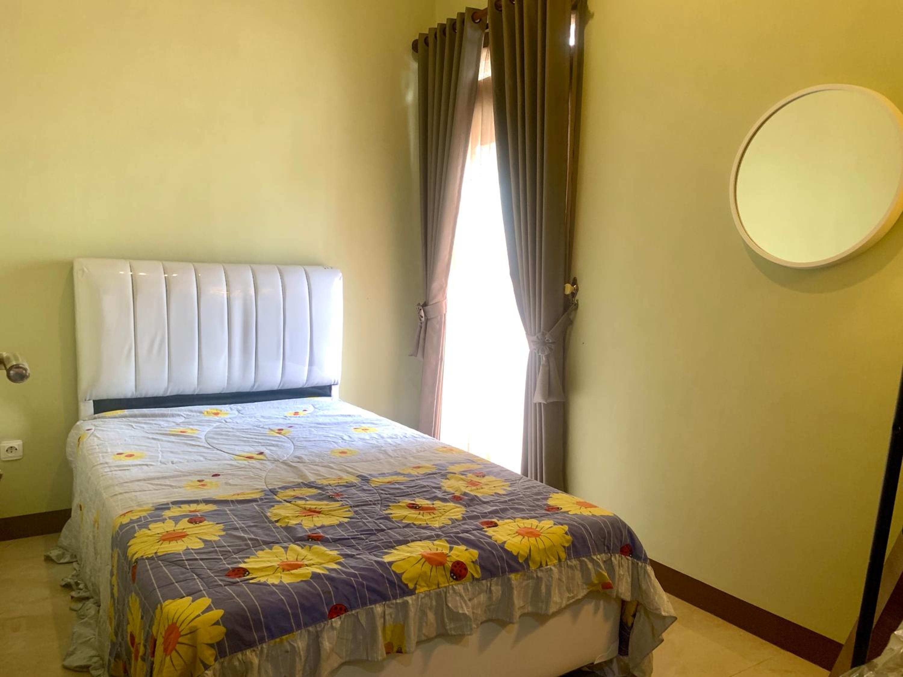 Three-Bedroom House - Photo 21