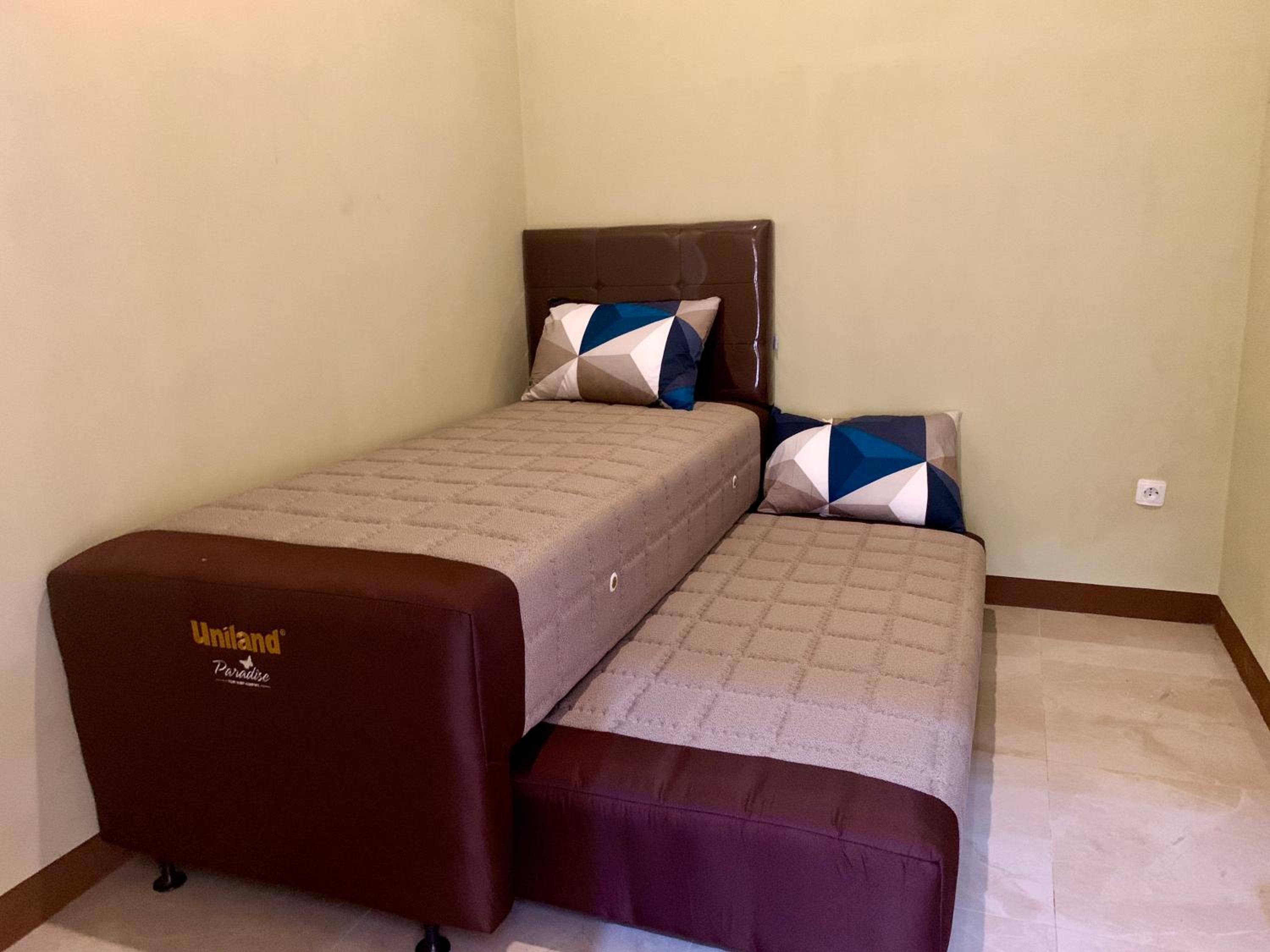 Three-Bedroom House - Photo 20