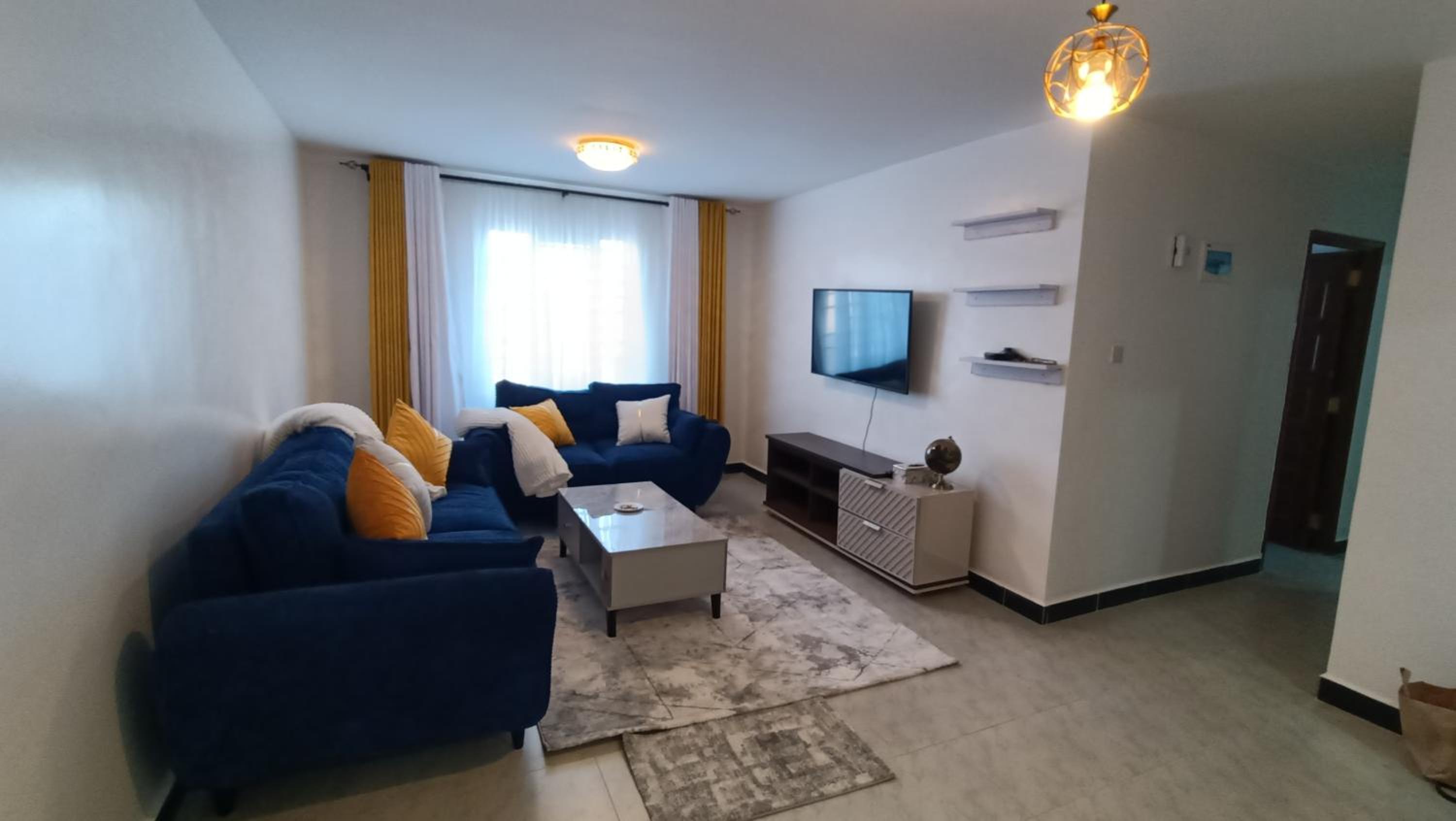 Three-Bedroom Apartment photo 2