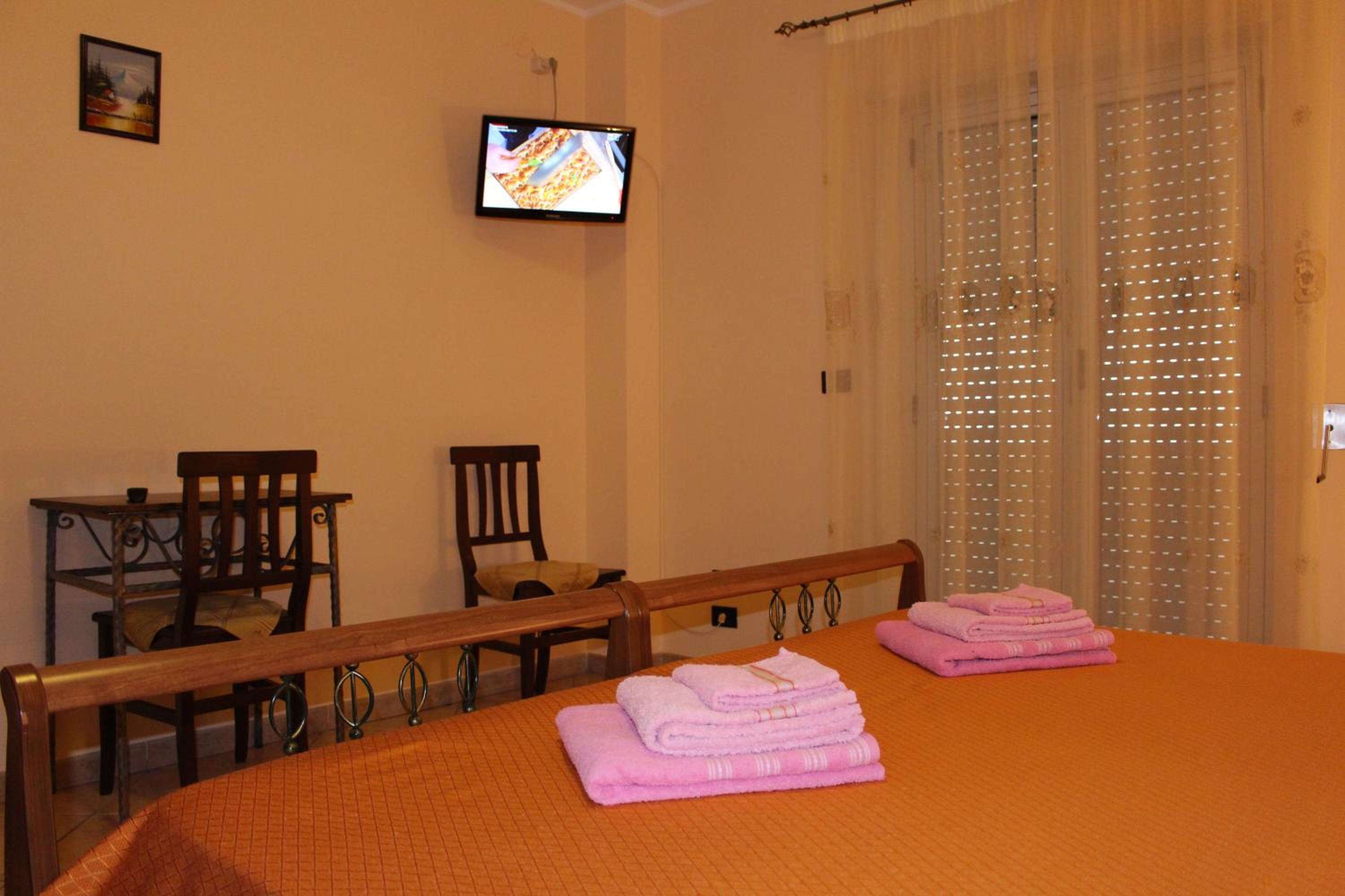 Quadruple Room with Balcony photo 2