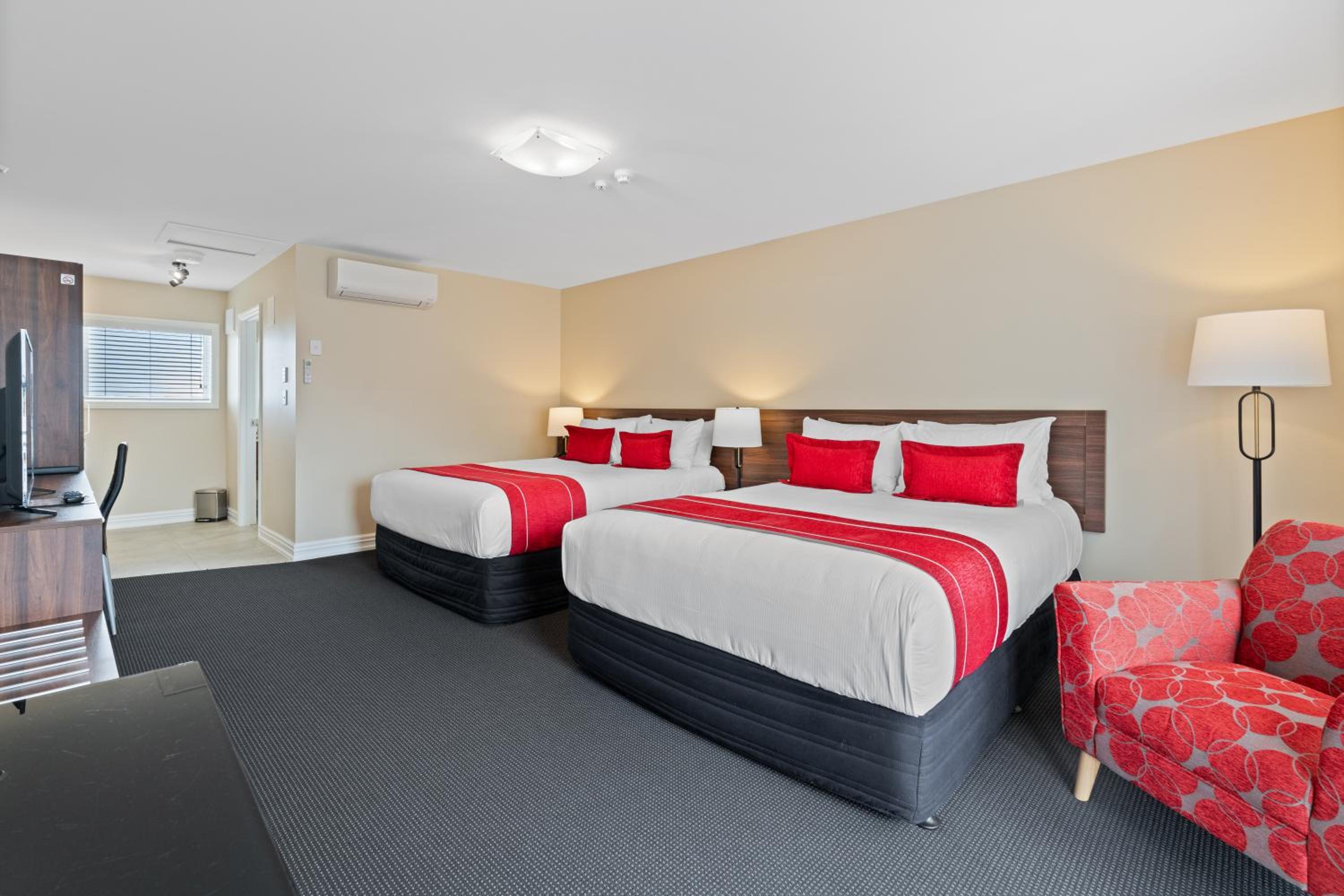 Superior Queen Room with Two Queen Beds - Photo 1