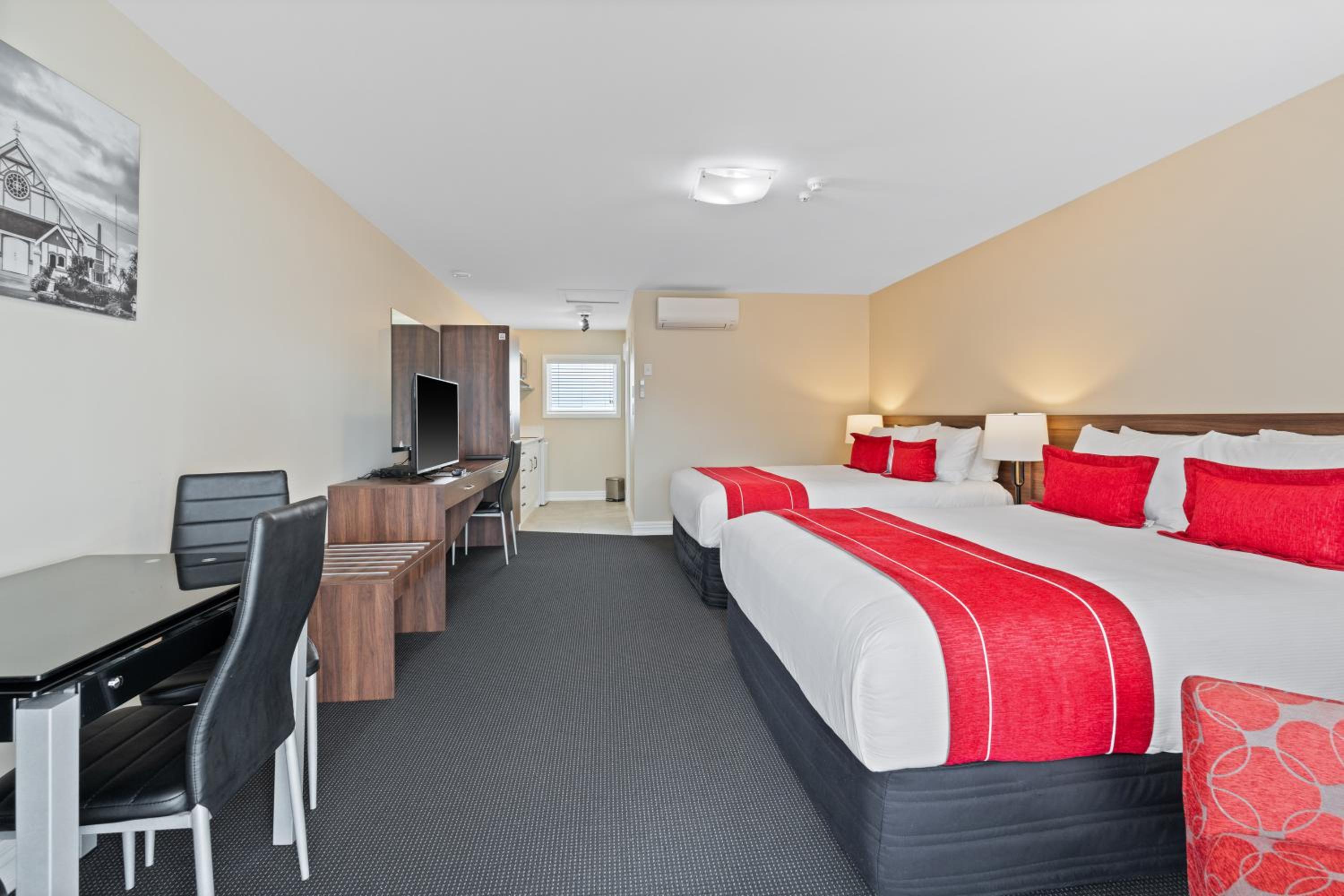 Deluxe Queen Room with Two Queen Beds - Photo 1