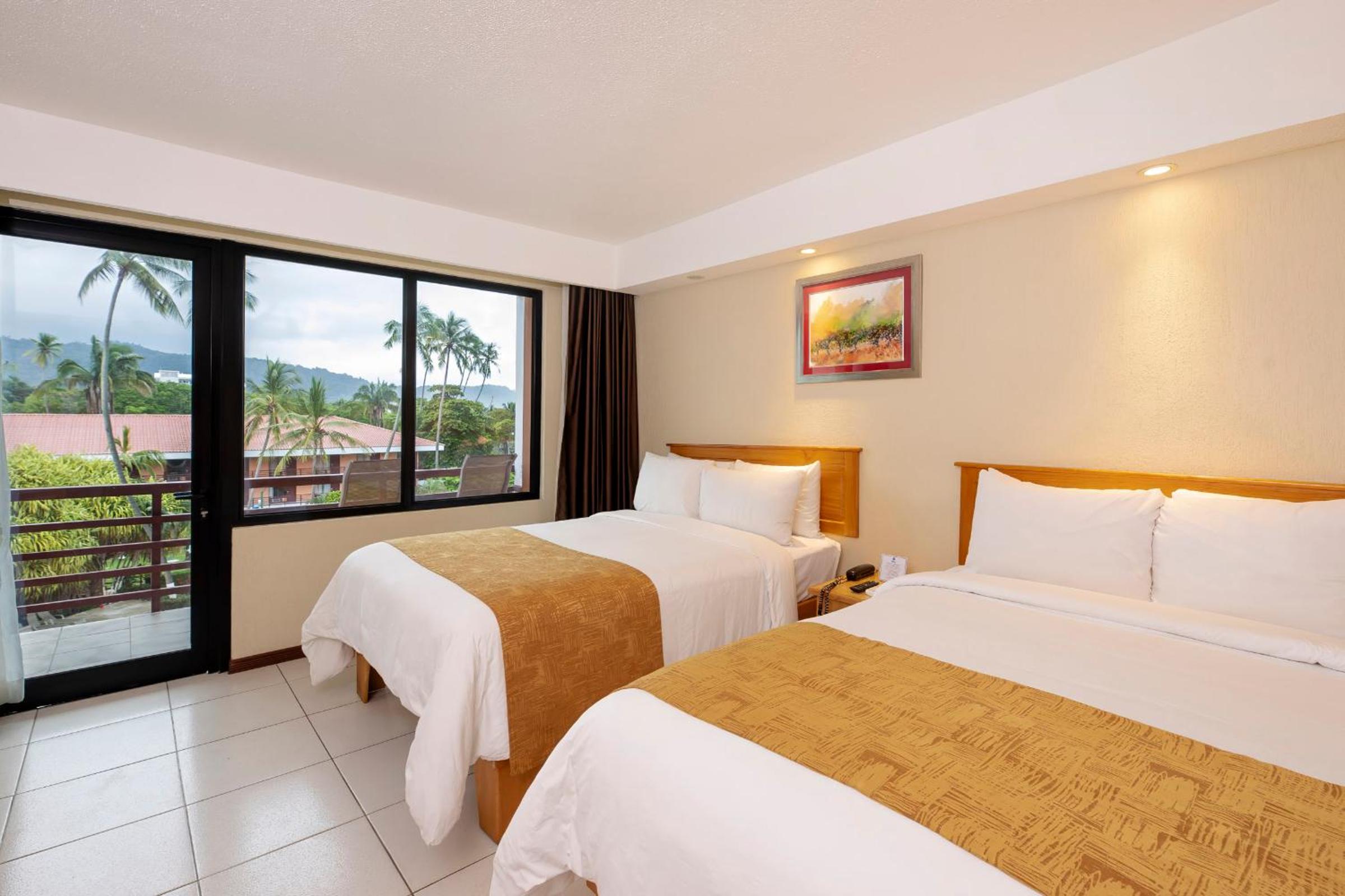 Double Room with Two Double Beds, Balcony and Pool View - Non-Smoking