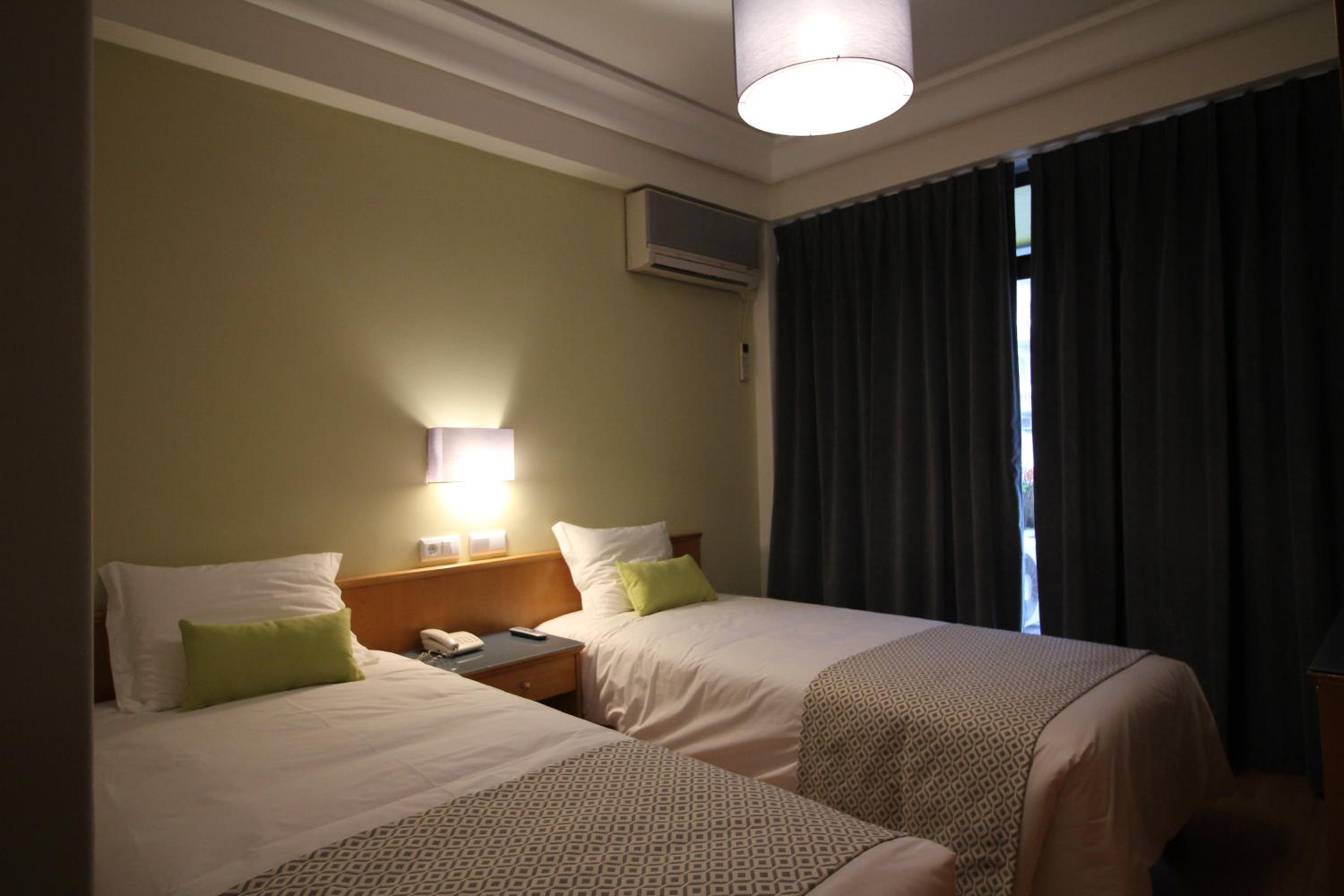Twin Room - Photo 1