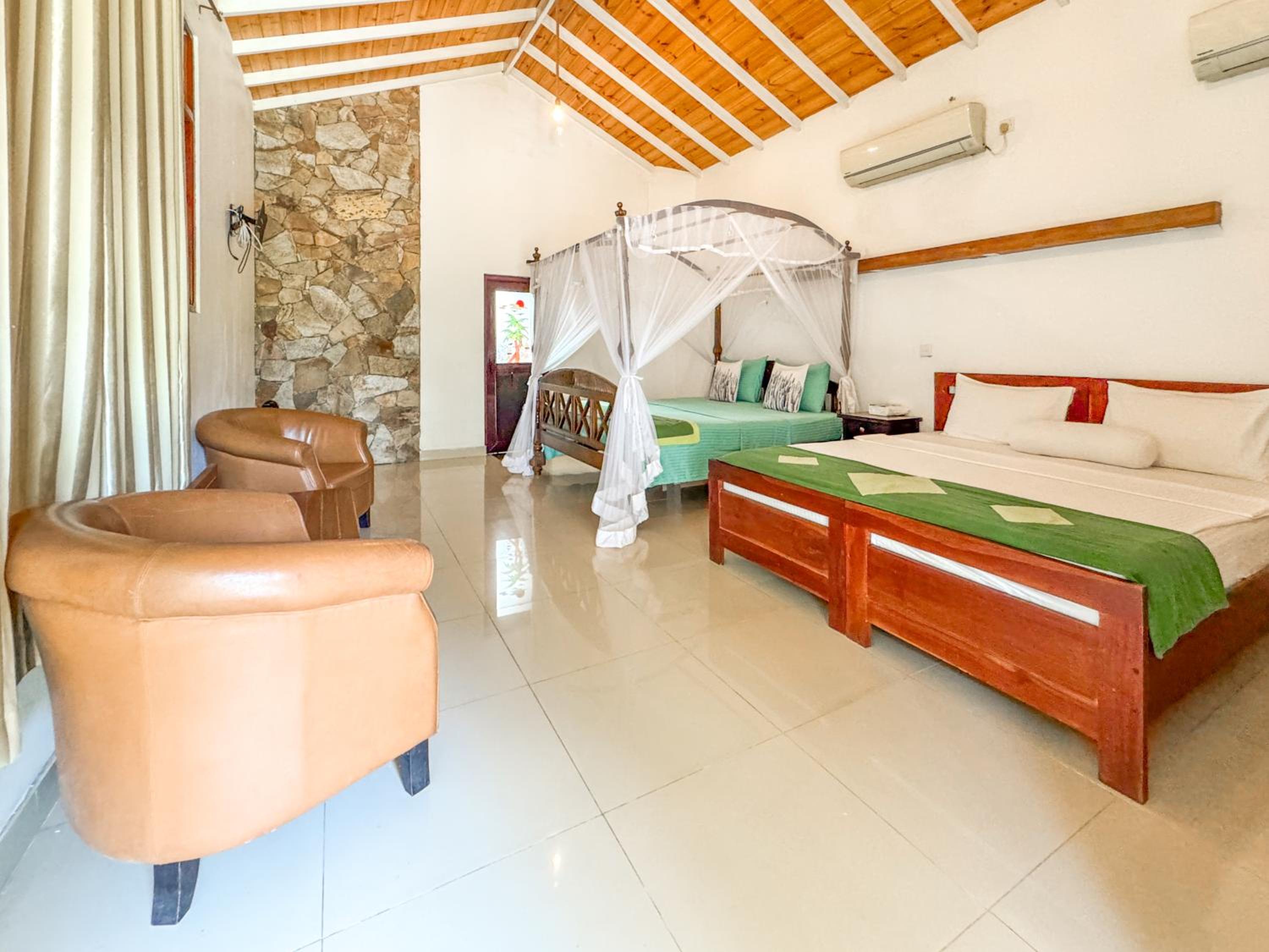 Deluxe Family Suite with Complimentary One-Way Airport Transfer (Pickup OR Drop) photo 1