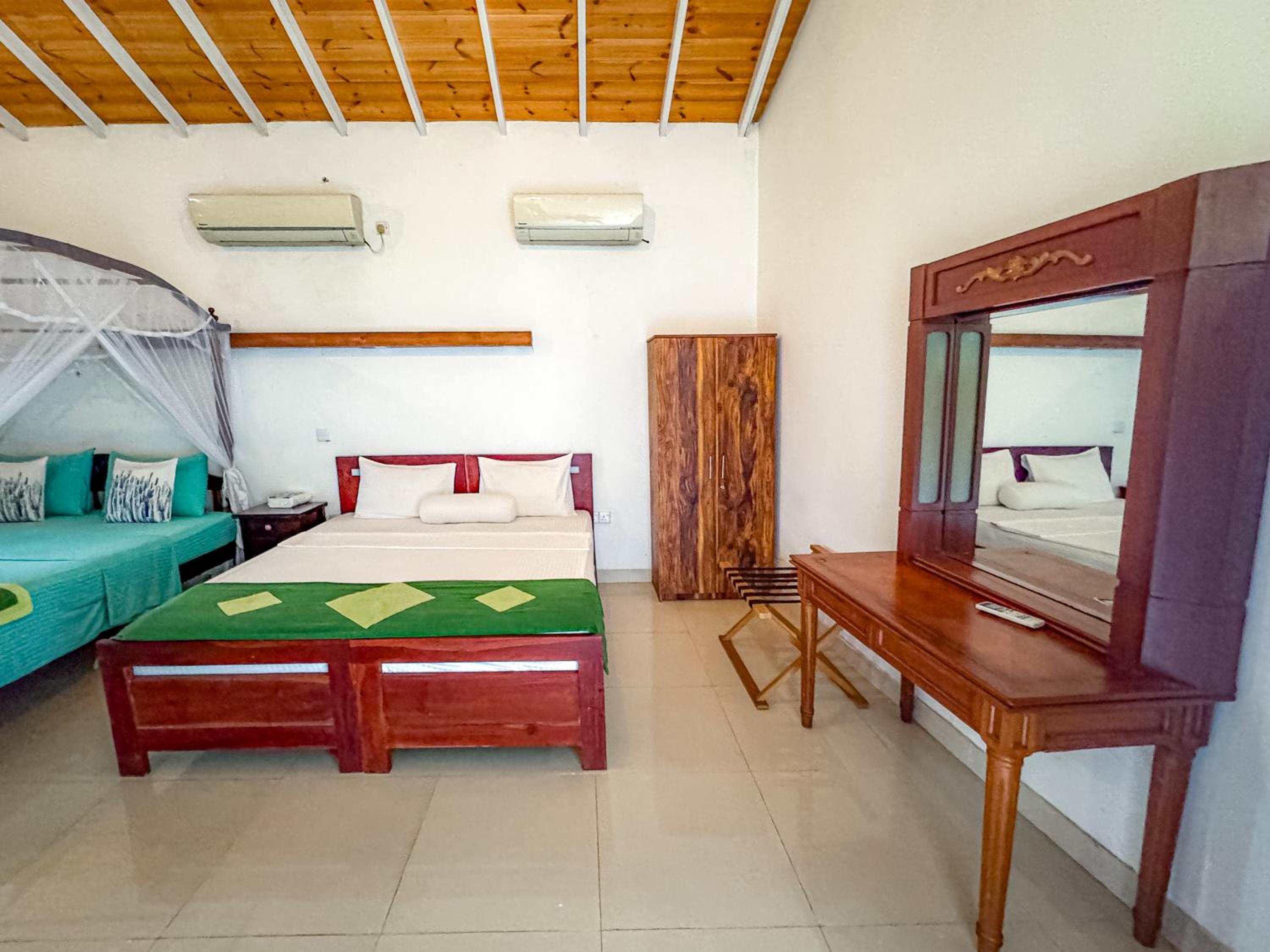Deluxe Family Suite with Complimentary One-Way Airport Transfer (Pickup OR Drop) photo 2
