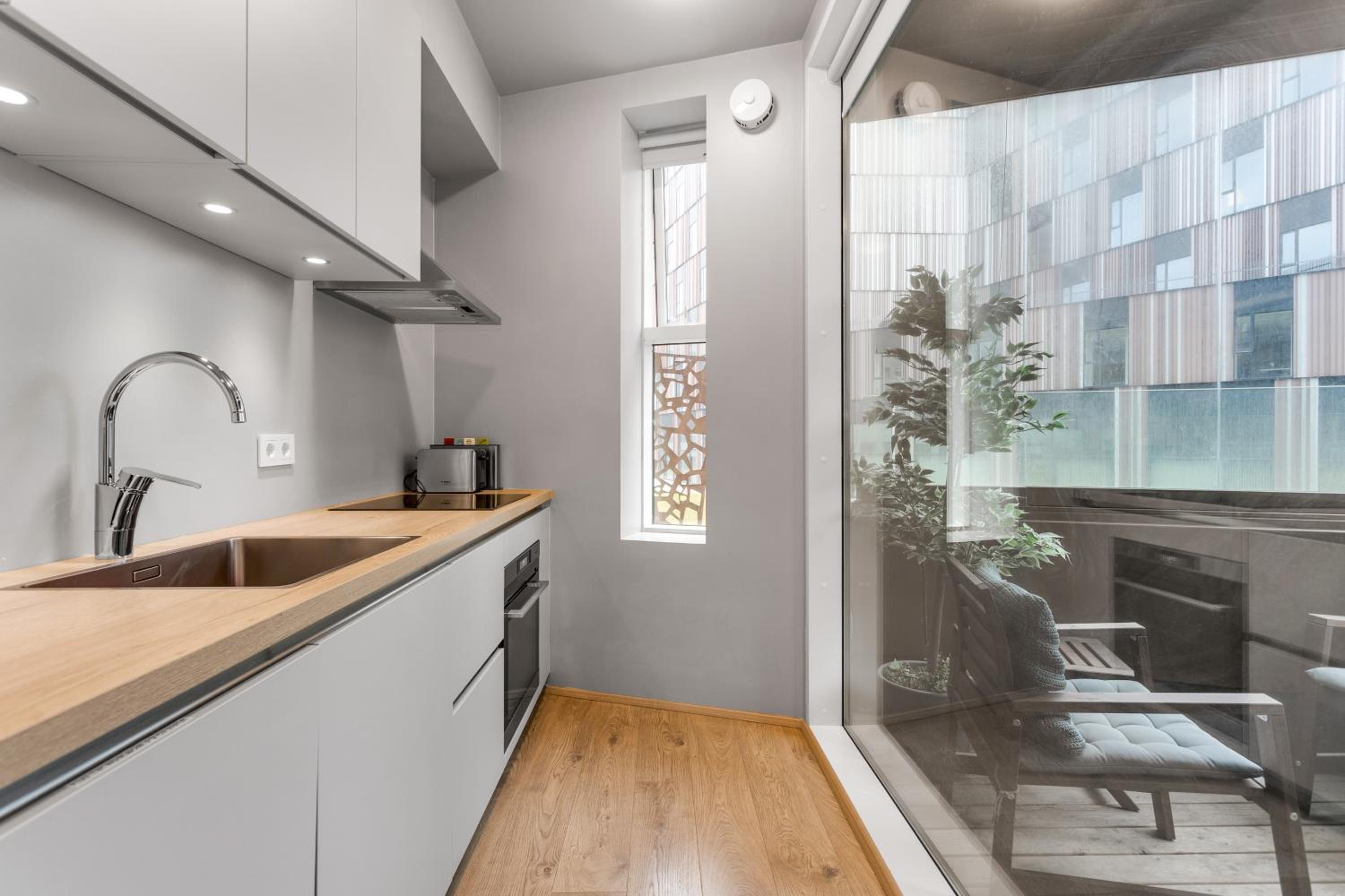 One-Bedroom Apartment with Balcony - Photo 33