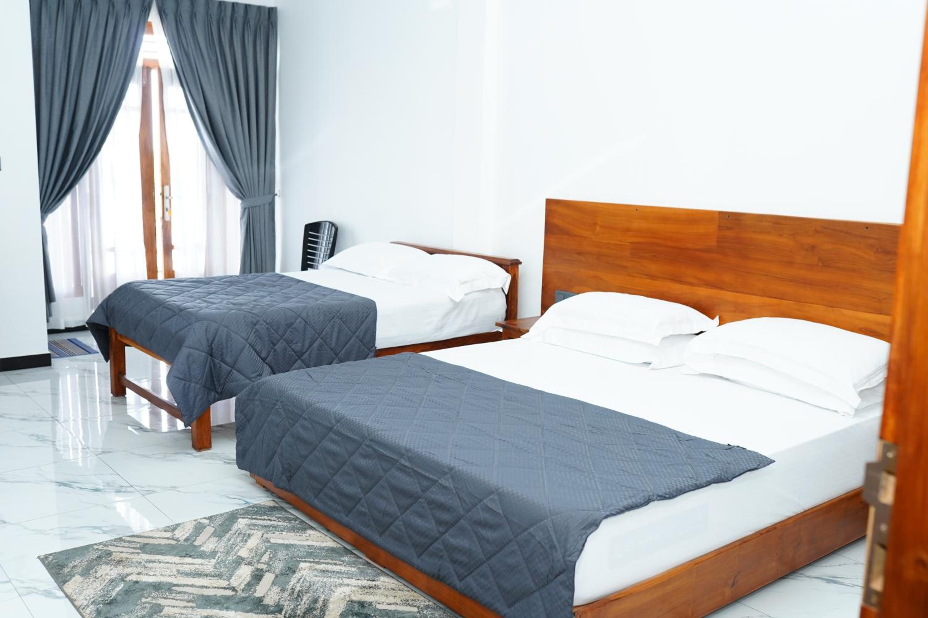 Deluxe Double Room (2 Adults + 1 Child) photo 1