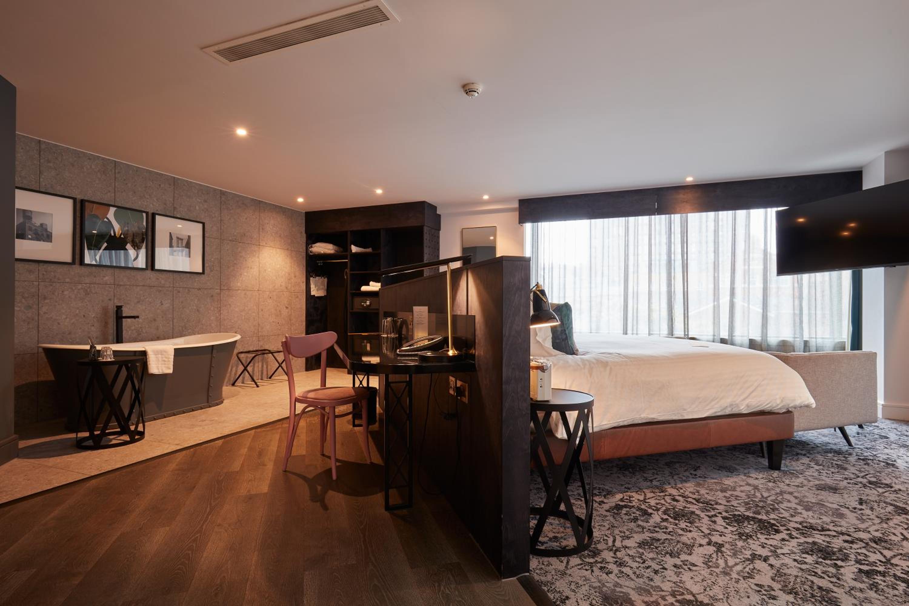 King Suite with Bath and Sofa Bed - Photo 1