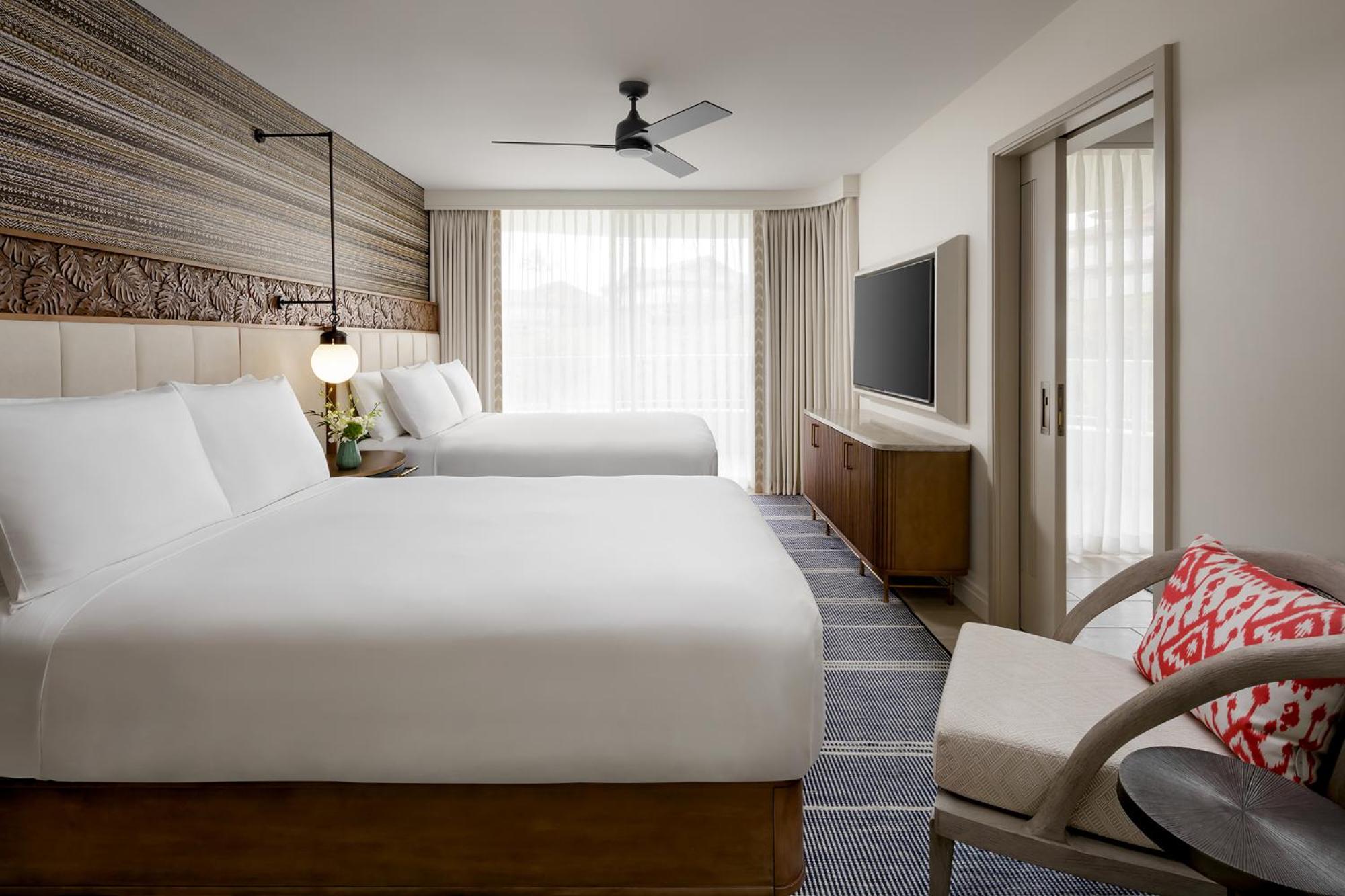 Deluxe Suite with Two Double Beds, Sofa Bed and Ocean View
